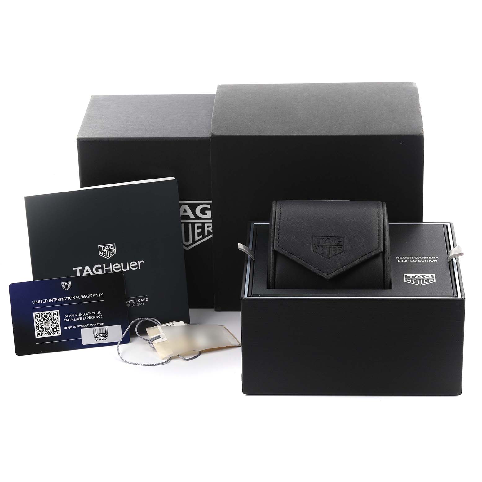 The image shows the packaging and accessories for a Tag Heuer Carrera CBK221G.FC6479 Men's Stainless Steel Red Dial CBK221G.FC6479 Men's Stainless Steel Red Dial, including the watch box, warranty card, and manual from a frontal angle.