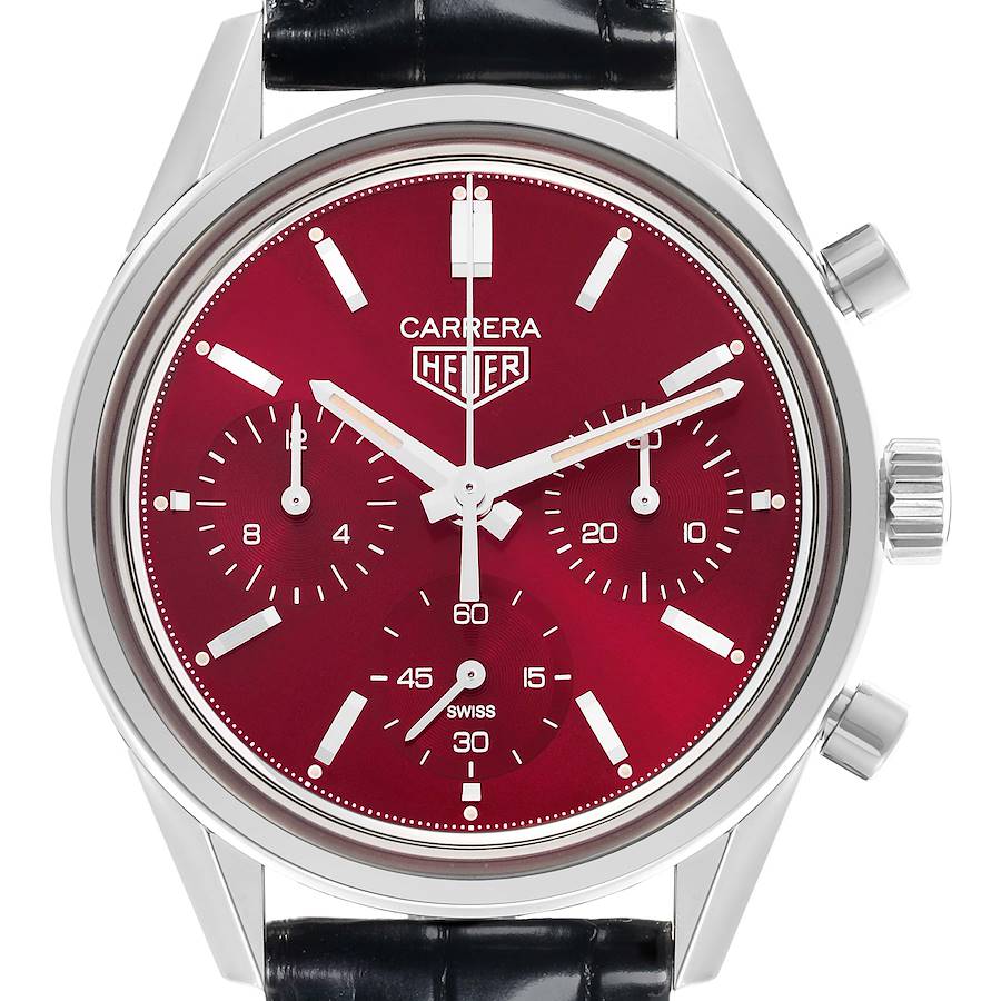 The Tag Heuer Carrera watch is shown from a front angle, highlighting its red dial, subdials, and crown.