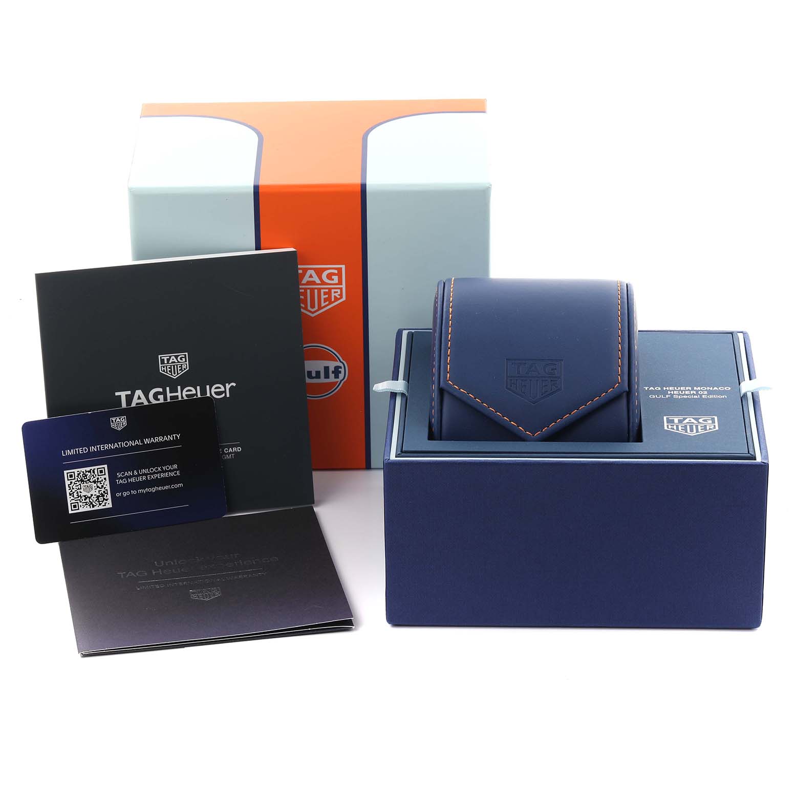 The image shows an angle displaying the Tag Heuer Monaco CBL2115.FC6494 Men's Stainless Steel Blue Dial CBL2115.FC6494 Men's Stainless Steel Blue Dial watch box, warranty card, and documents.