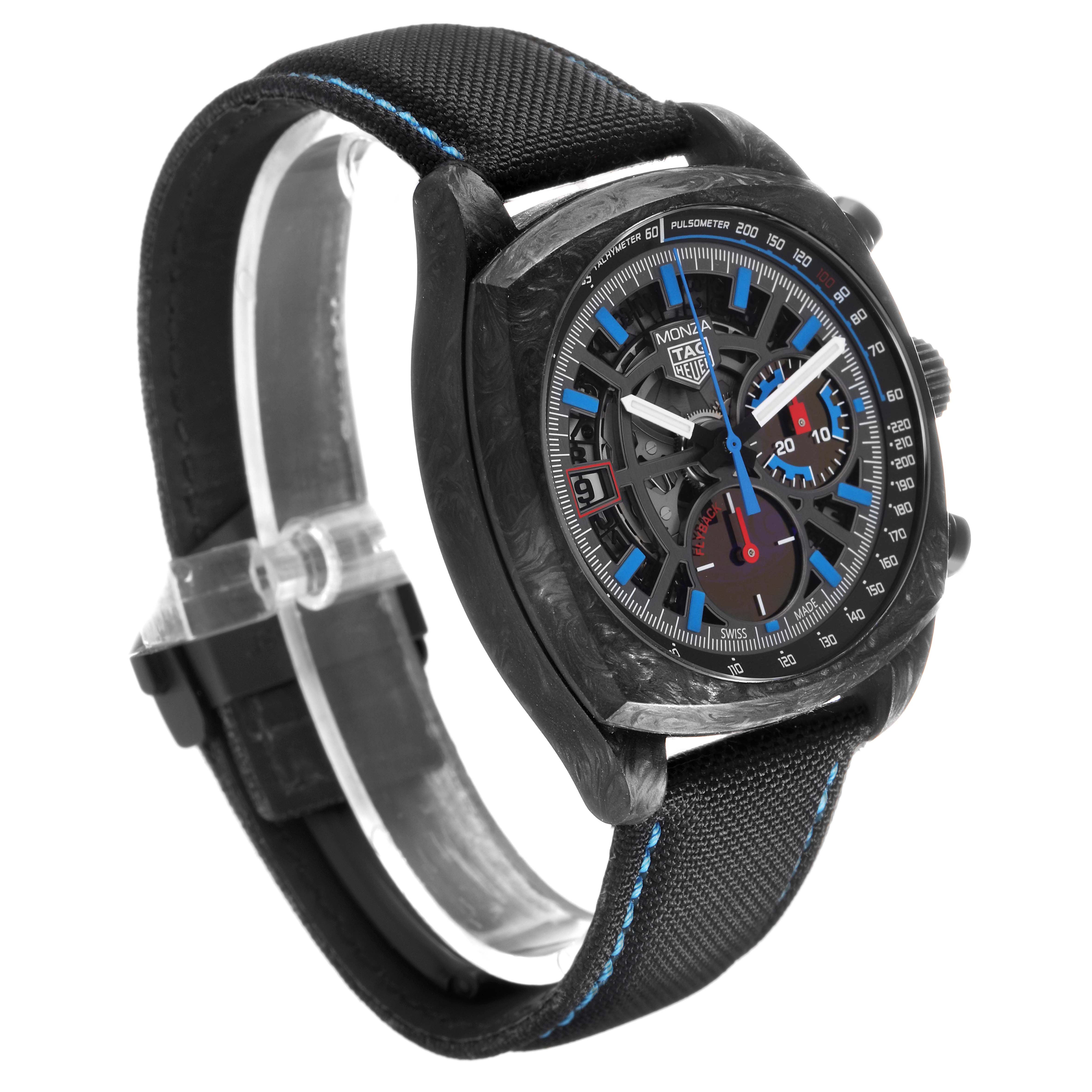 The Tag Heuer Monza CR5090.FN6001 Men's Titanium Grey Dial watch is shown at an angled side view, highlighting the dial, case, and strap with stitching details.