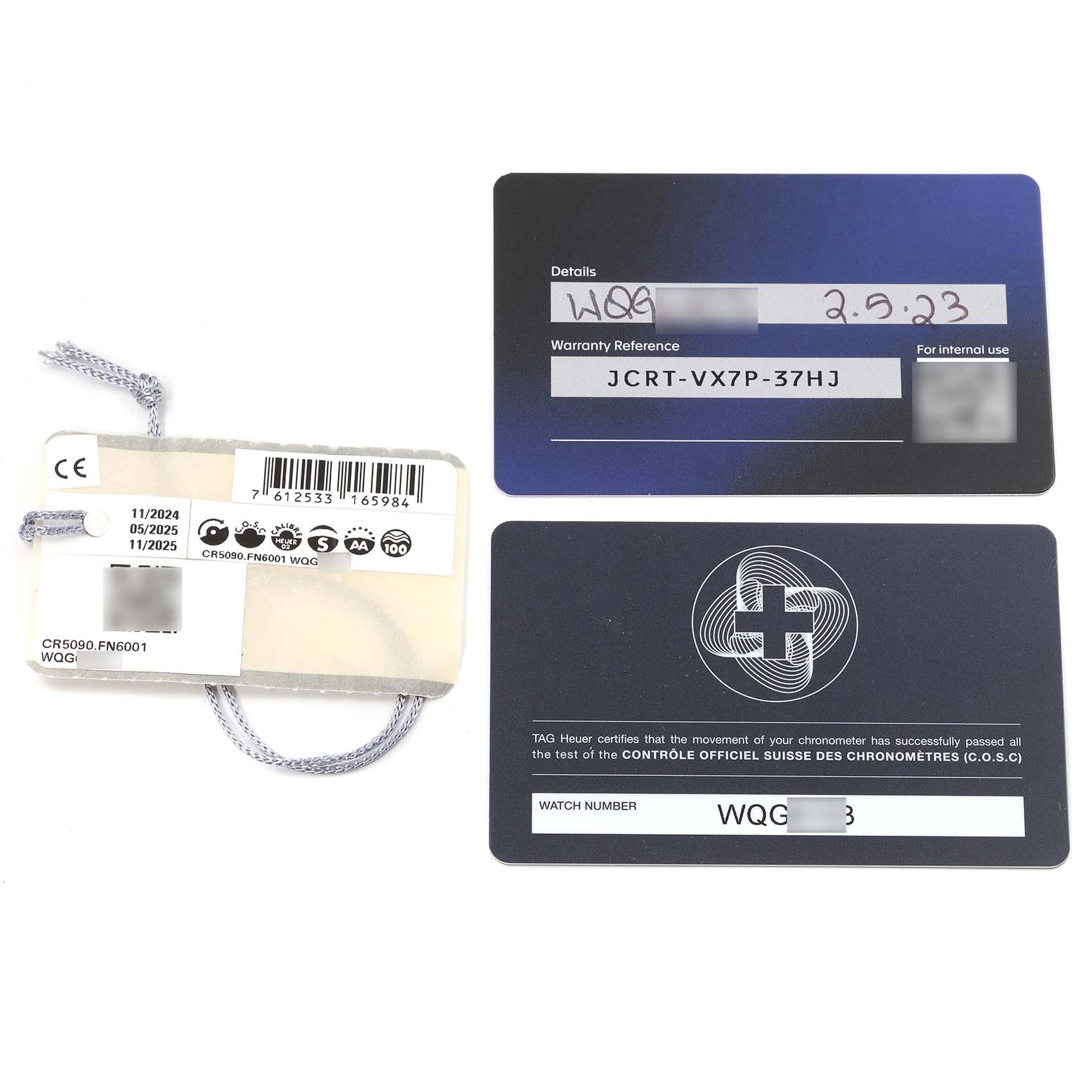 The image shows warranty and certification cards along with a tag for the Tag Heuer Monza CR5090.FN6001 Men
s Titanium Grey Dial CR5090.FN6001 Men
s Titanium Grey Dial model watch.