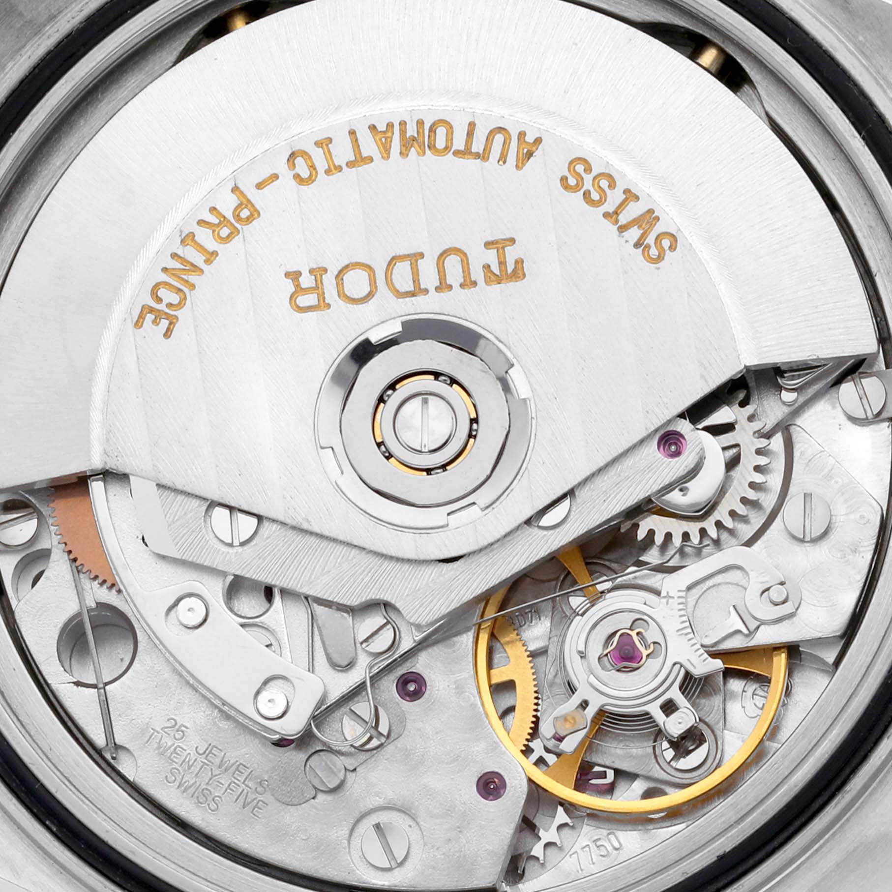 The image shows the intricate inner mechanism of the Tudor Tiger 79260 Men's Stainless Steel White Dial 79260 Men's Stainless Steel White Dial watch from a close-up angle, highlighting gears and the rotor.