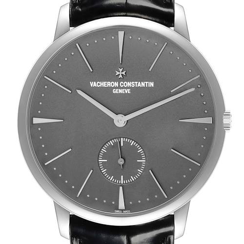 The Vacheron Constantin Patrimony watch is shown straight-on, highlighting the dial, hands, indices, and sub-dial.