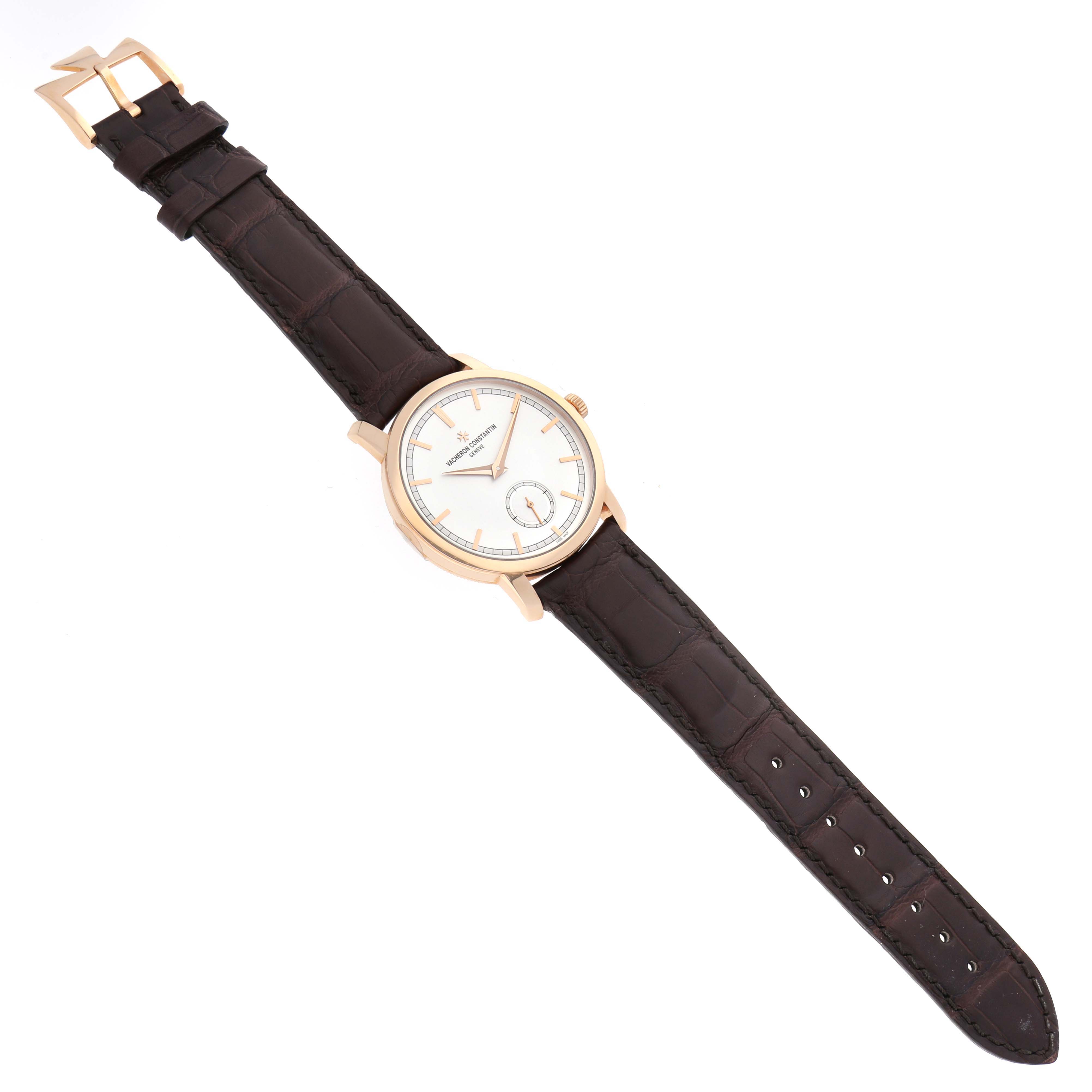 The Vacheron Constantin Traditionnelle 82172/000R-9382 Men's Rose Gold Silver Dial 82172/000R-9382 Men's Rose Gold Silver Dial watch is shown from a top-down angle, displaying the face, case, and leather strap.