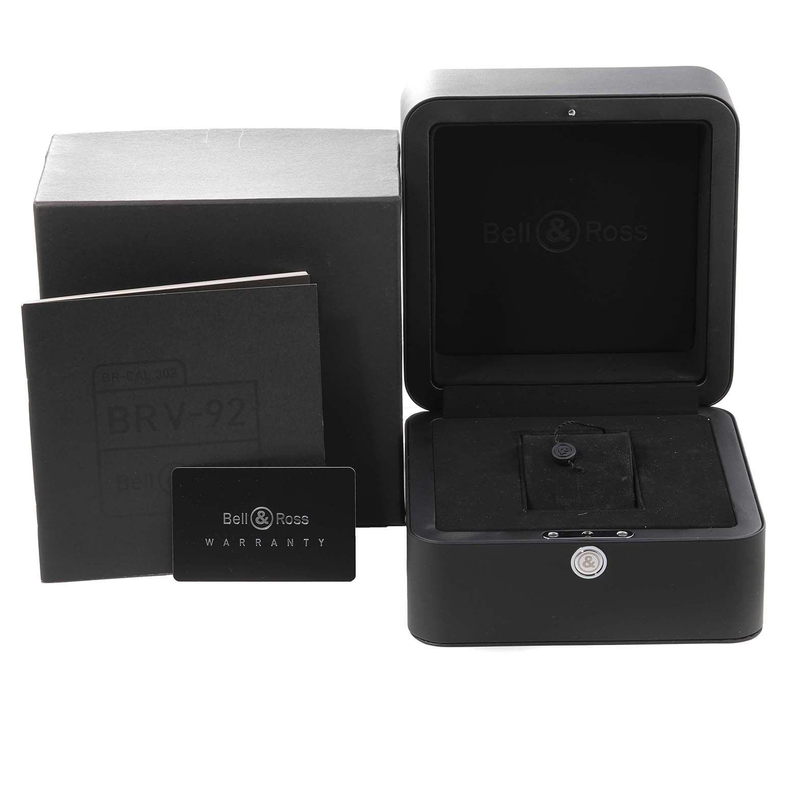 This image shows the packaging, warranty card, manual, and open display box for the Bell 
Ross Heritage BRV2-92-S-03618 Men
s Stainless Steel Beige Dial BRV2-92-S-03618 Men
s Stainless Steel Beige Dial model watch.