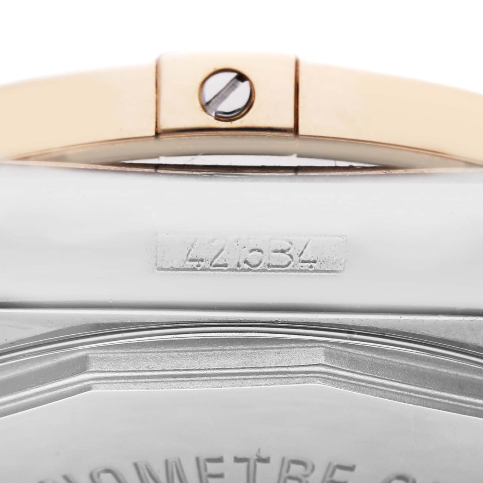 The image shows a close-up of the case back and part of the clasp of a Breitling Galactic C37330 Men's Steel and Gold (two tone) Mother of Pearl Dial C37330 Men's Steel and Gold (two tone) Mother of Pearl Dial model watch.