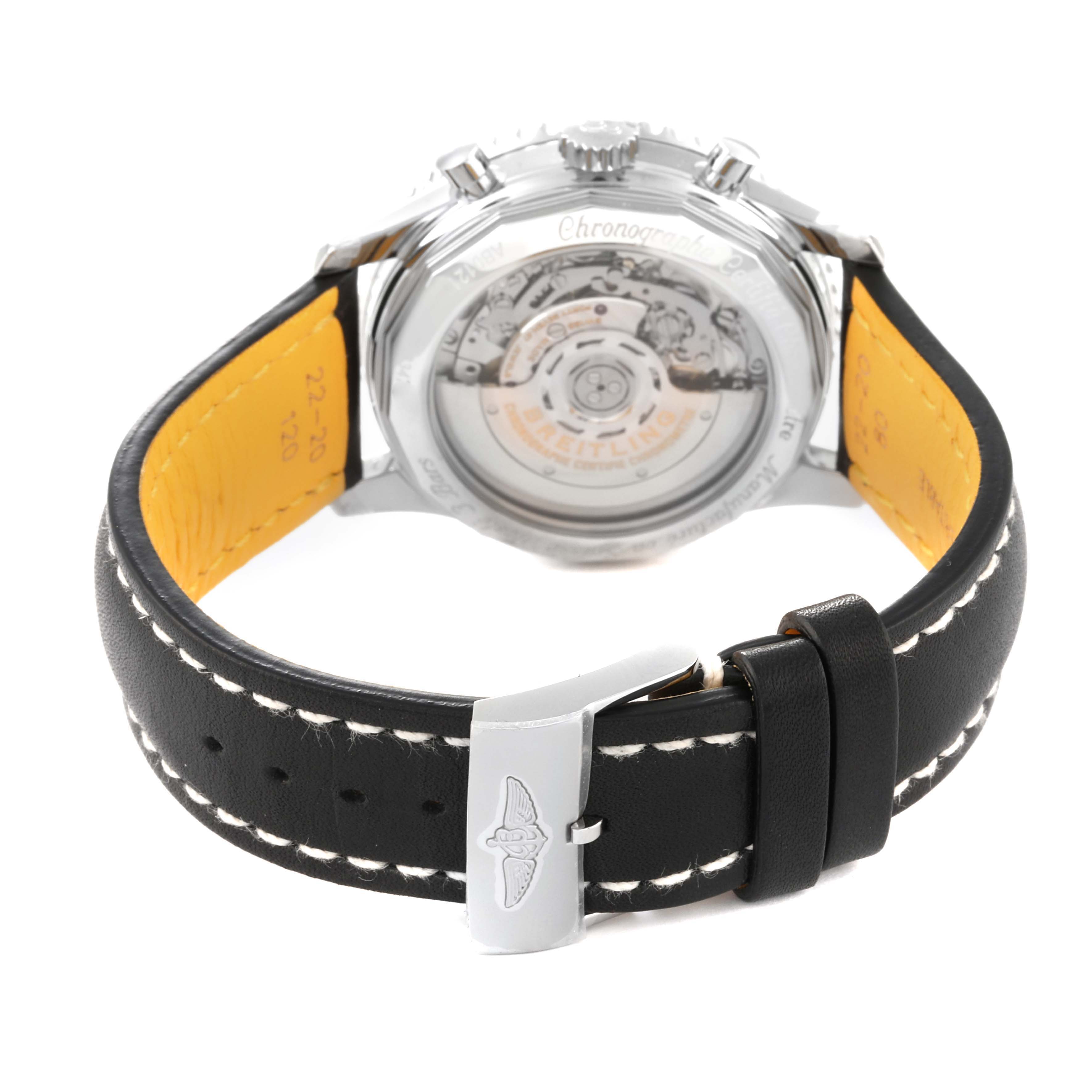 This image shows the back view of a Breitling Navitimer AB0121 Men's Stainless Steel Black Dial AB0121 Men's Stainless Steel Black Dial watch, highlighting the movement through the transparent case back and the leather strap with buckle.