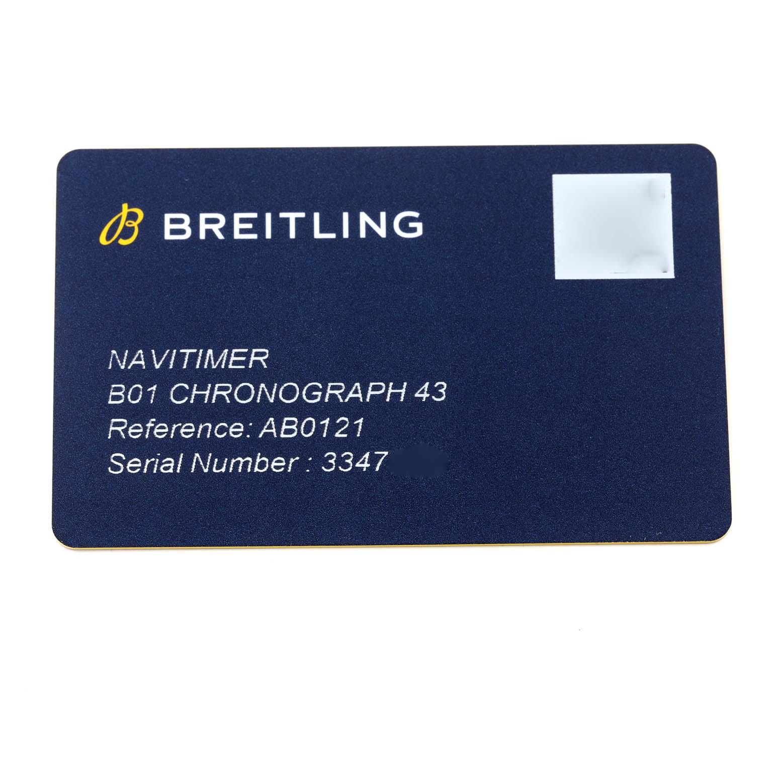 This image shows the Breitling Navitimer AB0121 Men's Stainless Steel Black Dial AB0121 Men's Stainless Steel Black Dial B01 Chronograph 43 warranty card from a top-down angle.