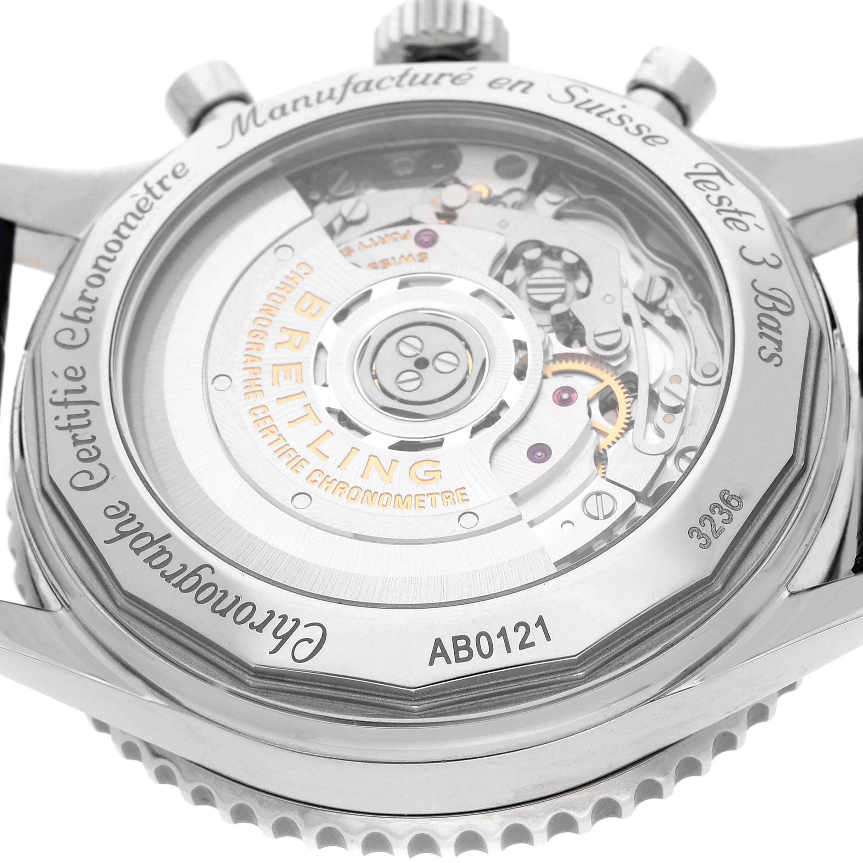 This image shows the back of a Breitling Navitimer AB0121 Men
s Stainless Steel Blue Dial AB0121 Men
s Stainless Steel Blue Dial watch, displaying its internal mechanism and markings.