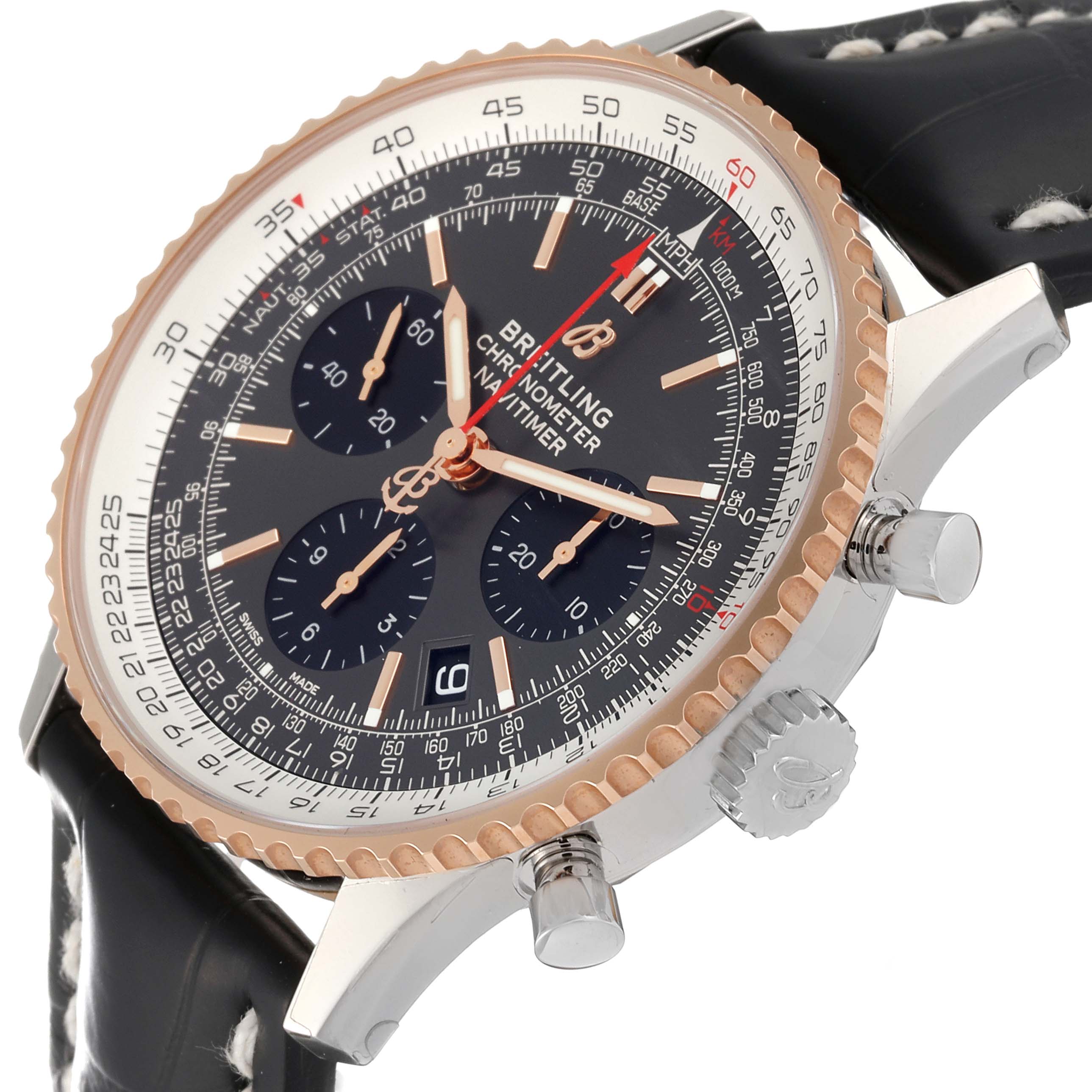 The image shows a close-up side angle of the Breitling Navitimer UB0121 Men's Steel and Gold (two tone) Grey Dial UB0121 Men's Steel and Gold (two tone) Grey Dial watch, highlighting the face, crown, and lugs with a partial view of the strap.