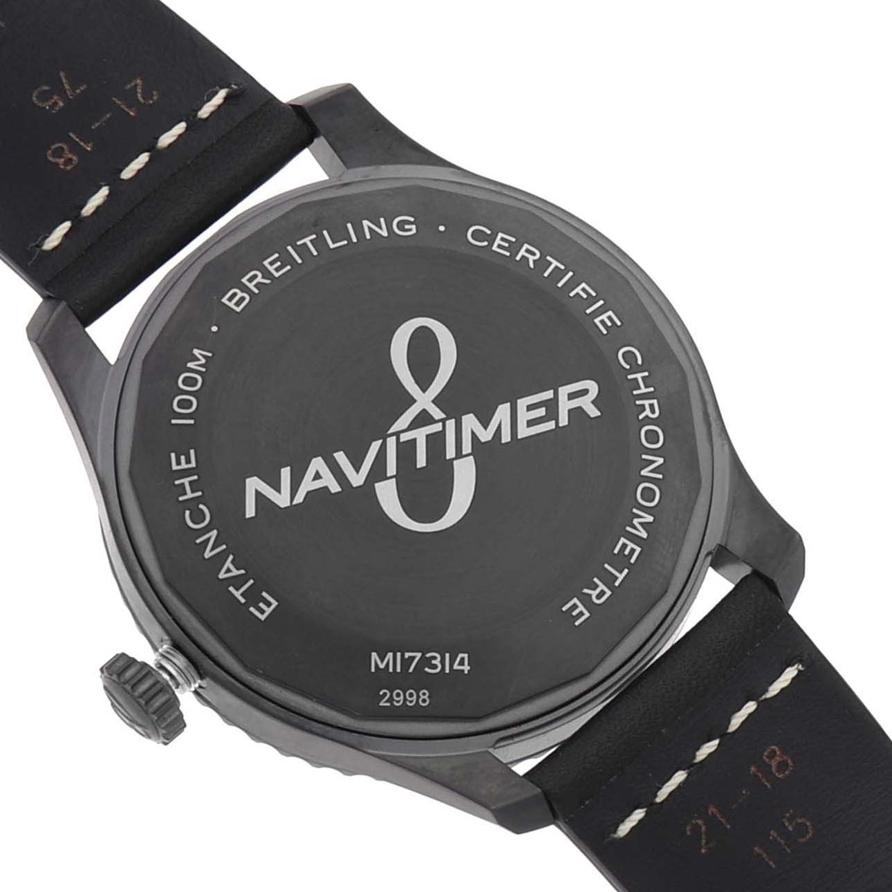 The image shows the back view of a Breitling Navitimer M17314 Men's Stainless Steel Black Dial M17314 Men's Stainless Steel Black Dial watch, displaying the case back and part of the leather strap.