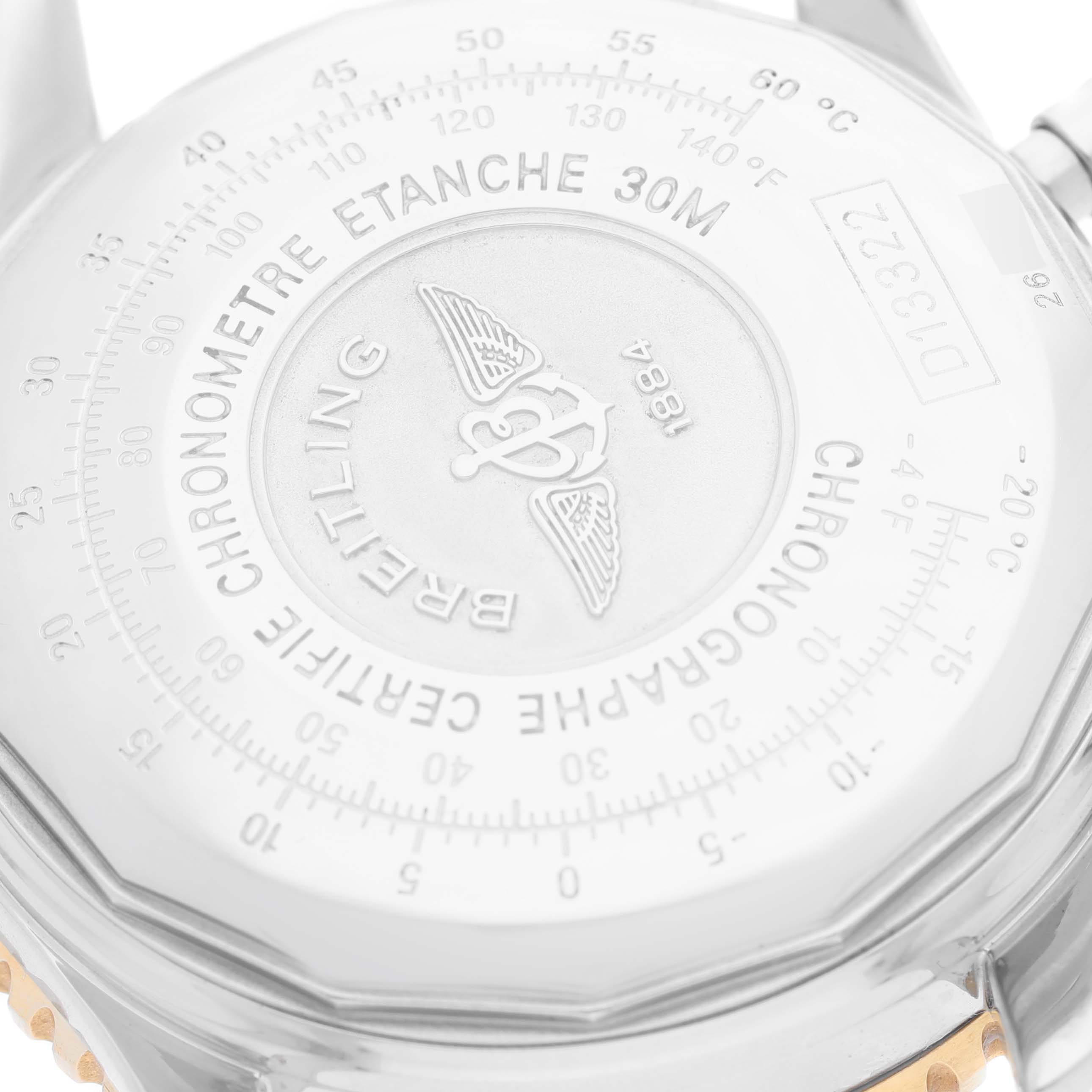 This image shows the case back and part of the lugs of a Breitling Navitimer D13322 Men's Steel and Gold (two tone) Silver Dial D13322 Men's Steel and Gold (two tone) Silver Dial watch.