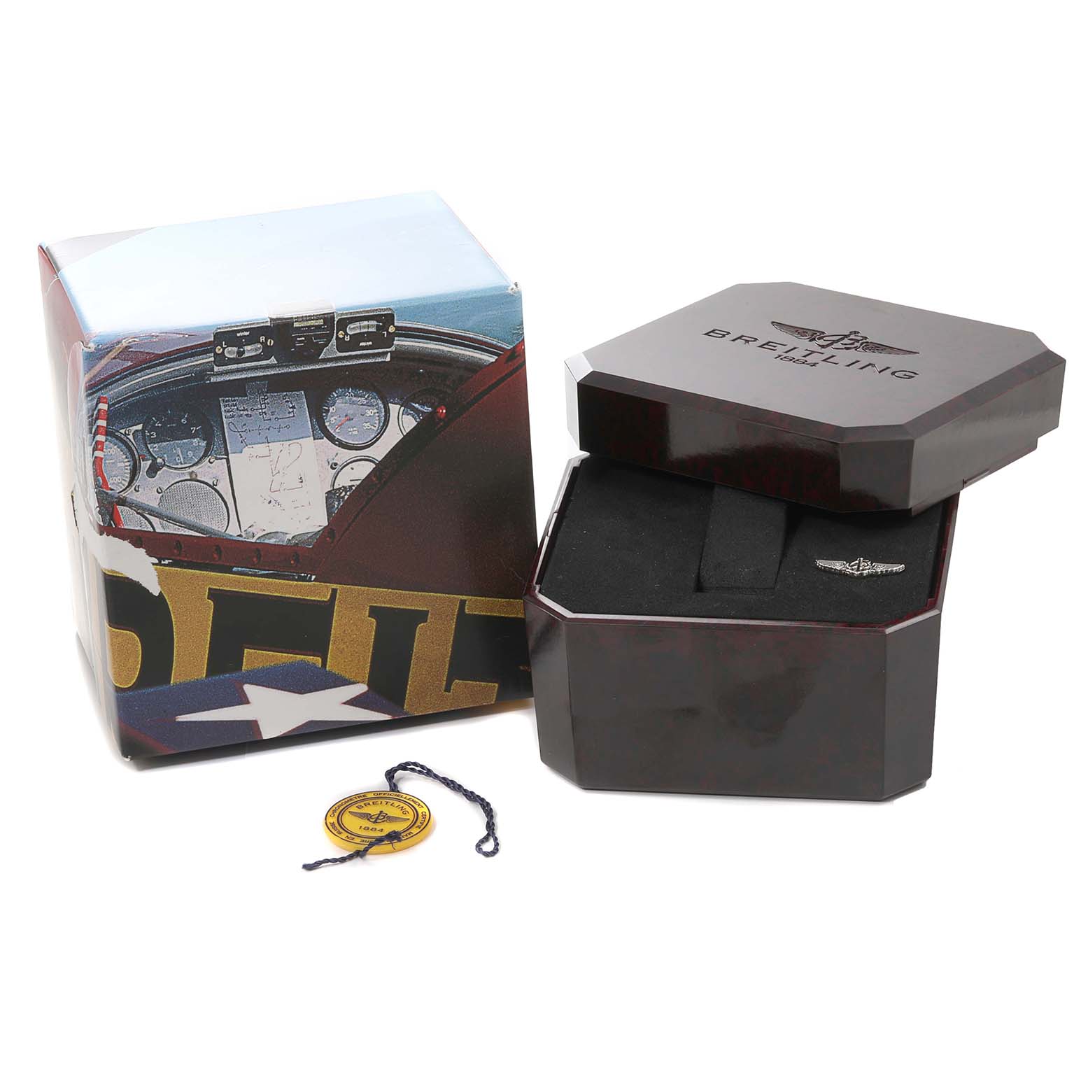 The image shows the packaging box, inner case, and tags for a Breitling Navitimer D13322 Men's Steel and Gold (two tone) Silver Dial D13322 Men's Steel and Gold (two tone) Silver Dial watch.