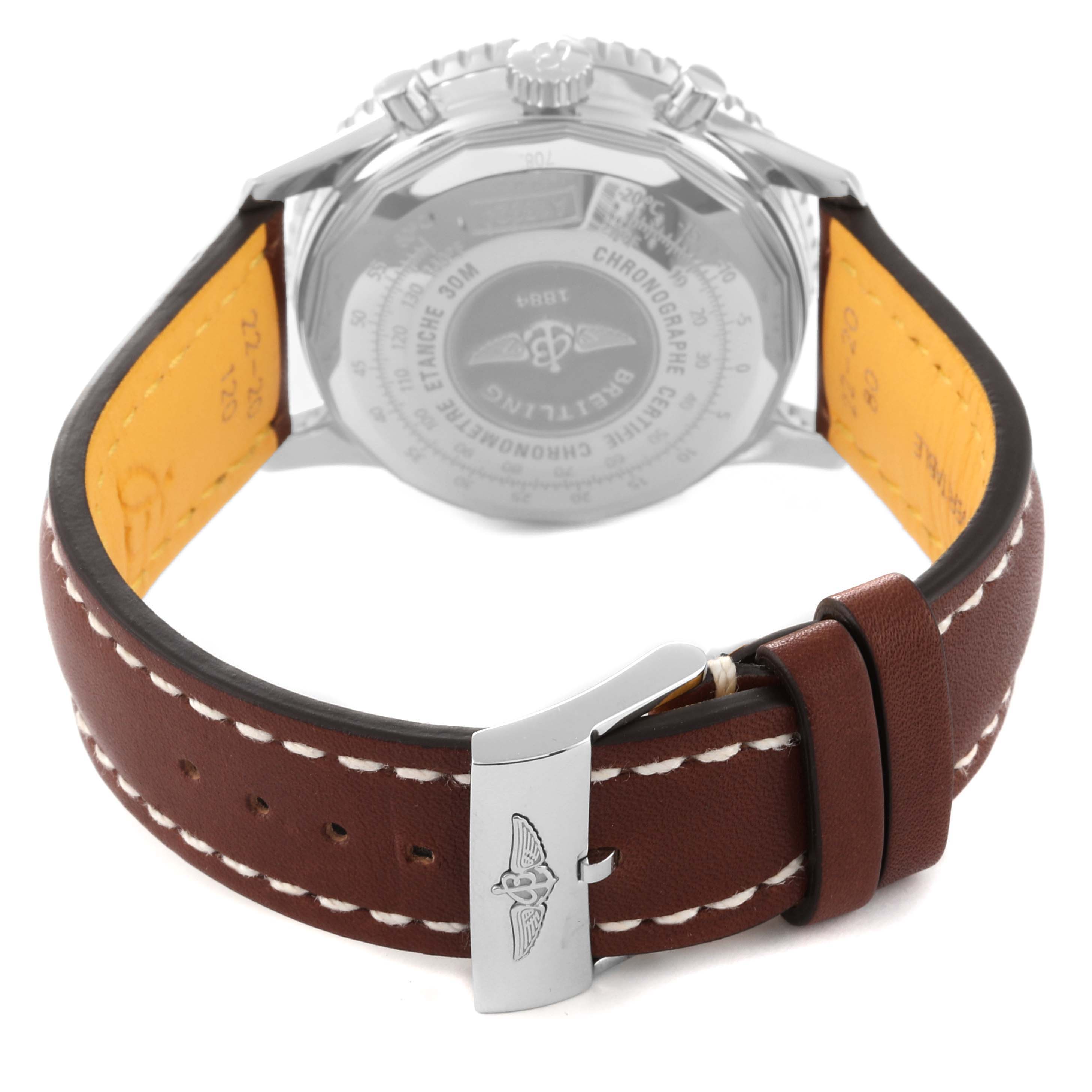 The image shows the back view of a Breitling Navitimer A13324 Men
s Stainless Steel Silver Dial A13324 Men
s Stainless Steel Silver Dial watch, highlighting the leather strap and clasp.