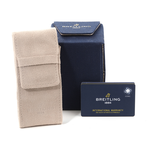 This image shows the packaging, case, and international warranty card for a Breitling Superocean A17375 Men's Stainless Steel Blue Dial A17375 Men's Stainless Steel Blue Dial model watch.