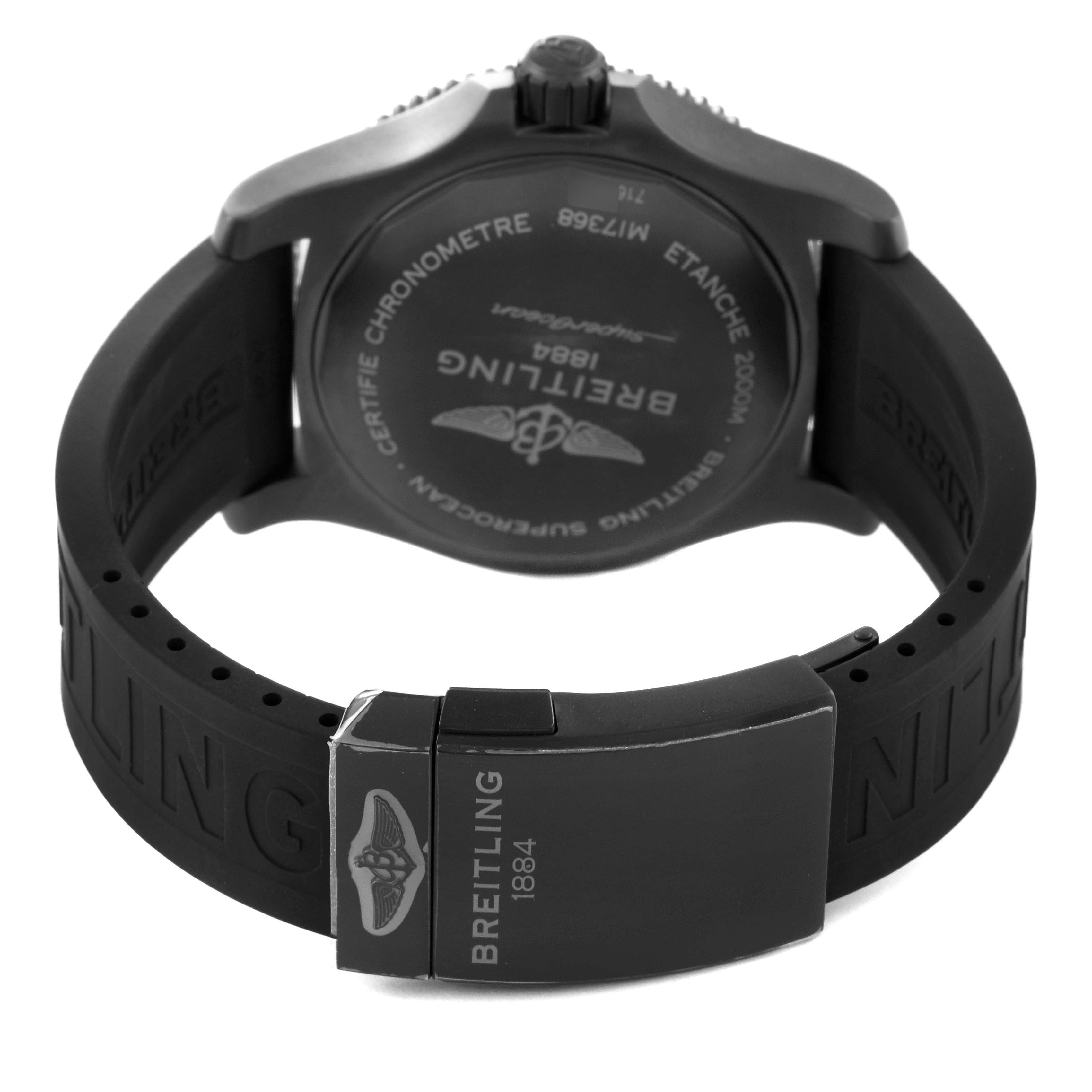 The image shows the back casing and clasp of a Breitling Superocean M17368 Men's Stainless Steel Yellow Dial M17368 Men's Stainless Steel Yellow Dial watch, highlighting its black rubber strap and engraved details.