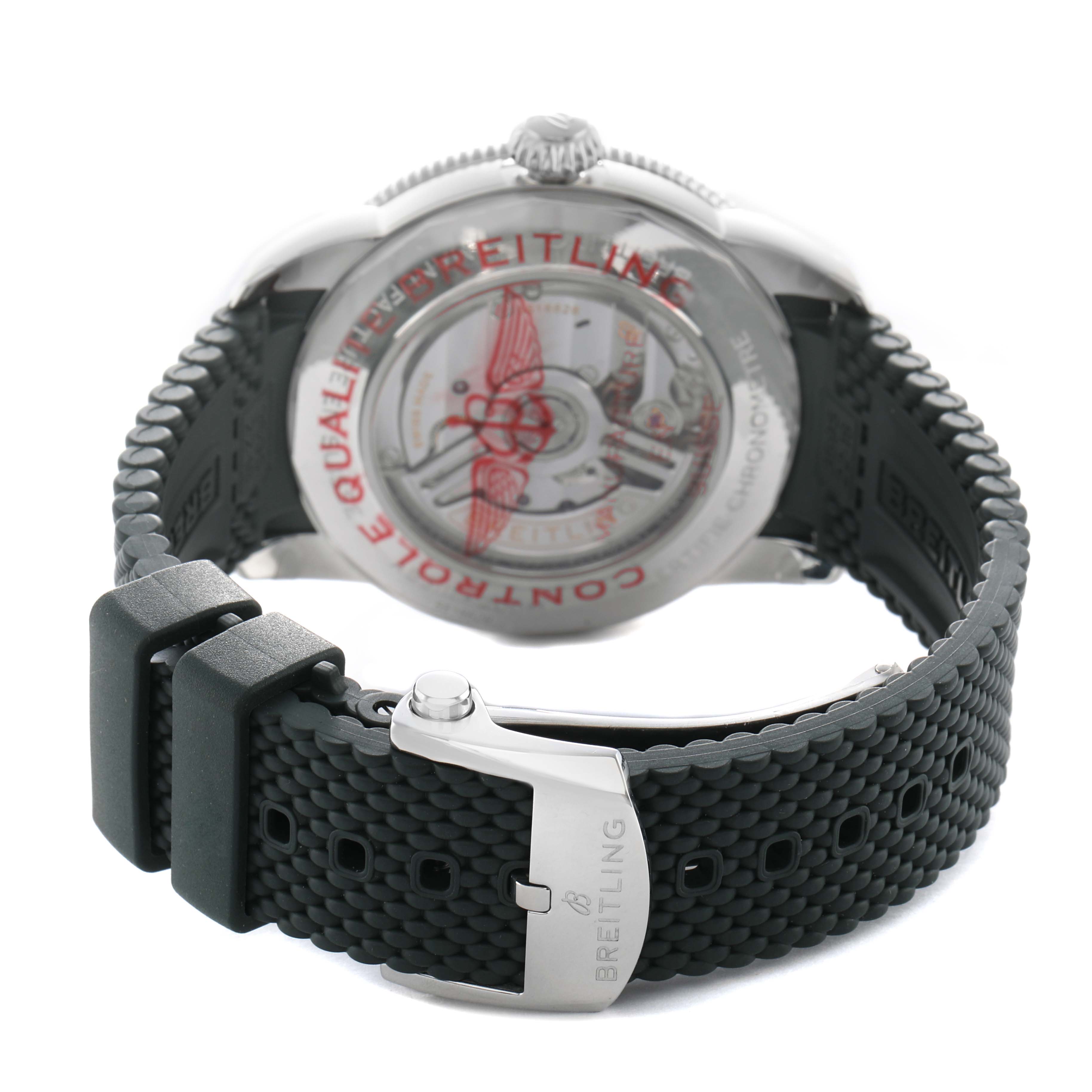 The image shows the back view of a Breitling Superocean AB3111 Men's Stainless Steel Green Dial watch, highlighting the exhibition case back and textured black strap with a buckle.