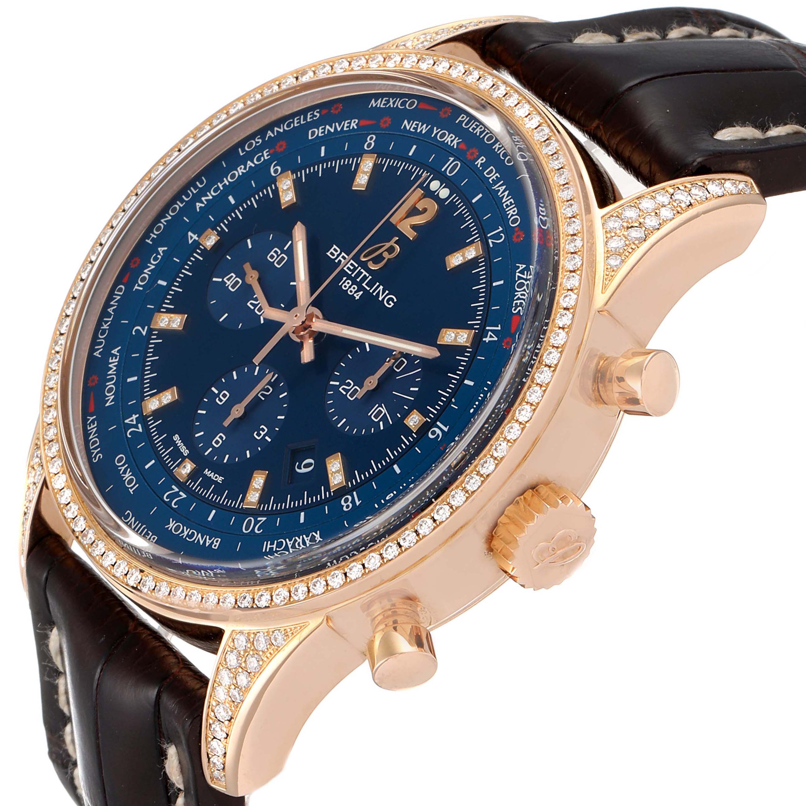 The Breitling Transocean RB0510 Men's Rose Gold Blue Dial RB0510 Men's Rose Gold Blue Dial watch is shown at an angled side view, highlighting the bezel, crown, pushers, and part of the strap.