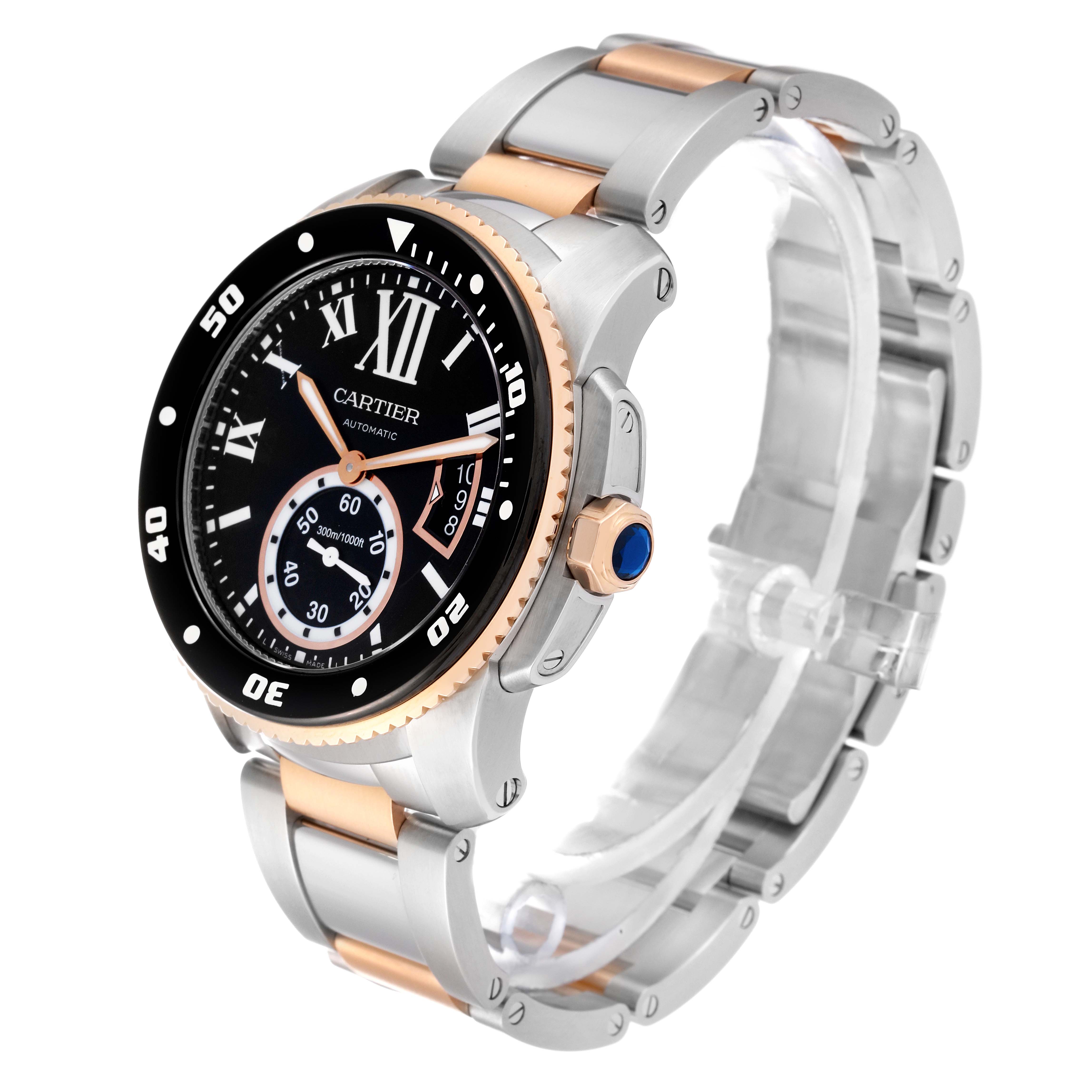 The image shows a Calibre de Cartier watch by Cartier at a slight angle, highlighting the face, crown, and metal bracelet.