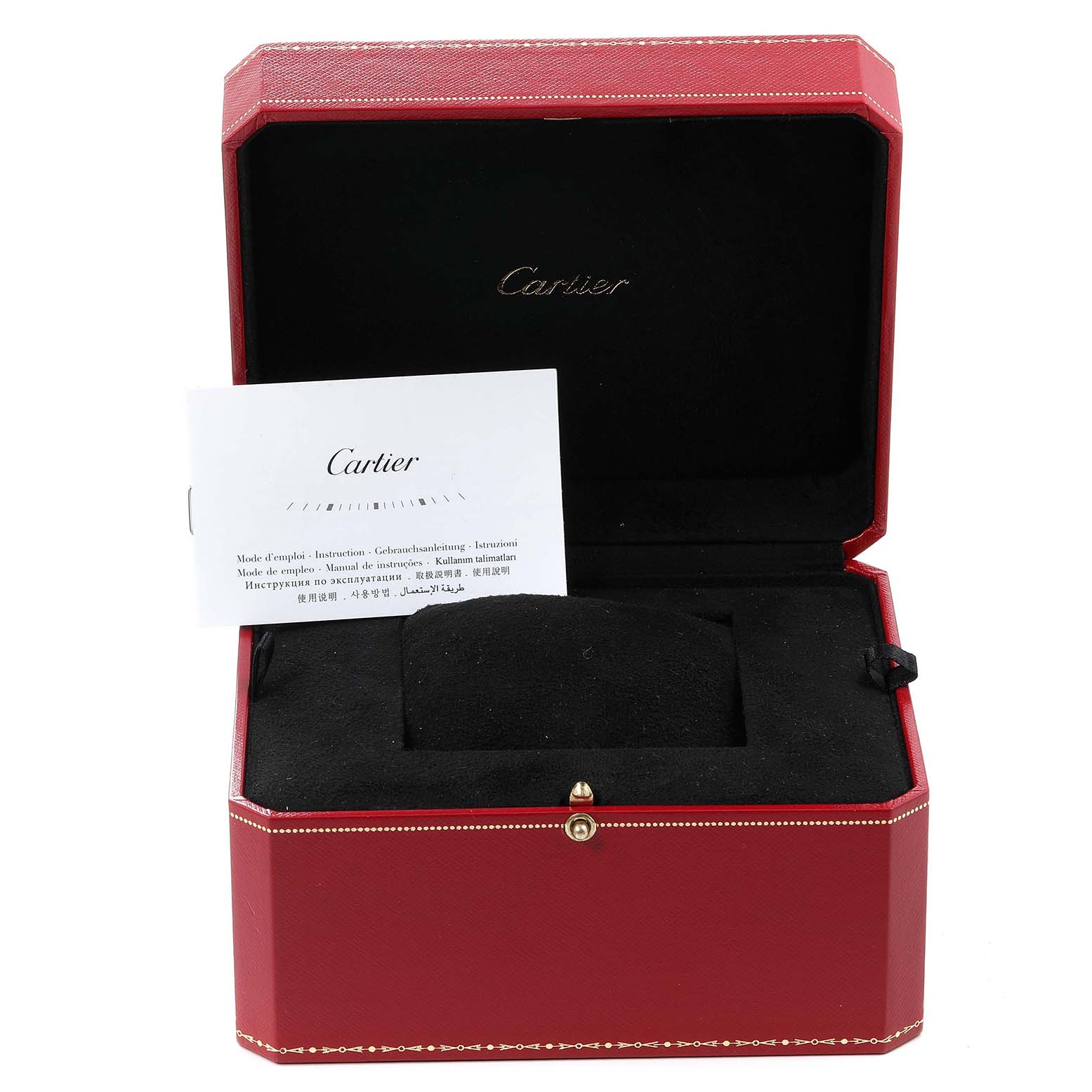 The image shows an open red Cartier box for the Calibre de Cartier model, with an instruction booklet inside.