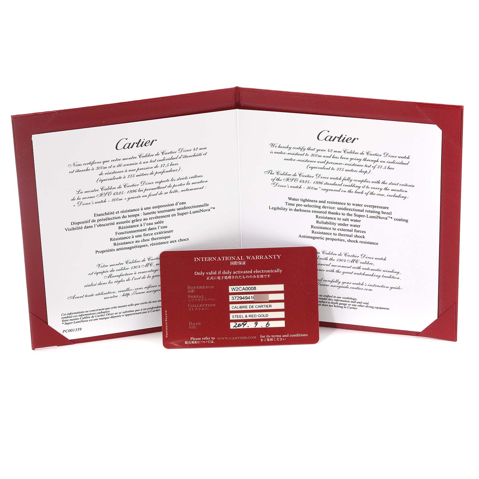 The image shows the warranty card and documents of a Calibre de Cartier watch by Cartier from a front angle.
