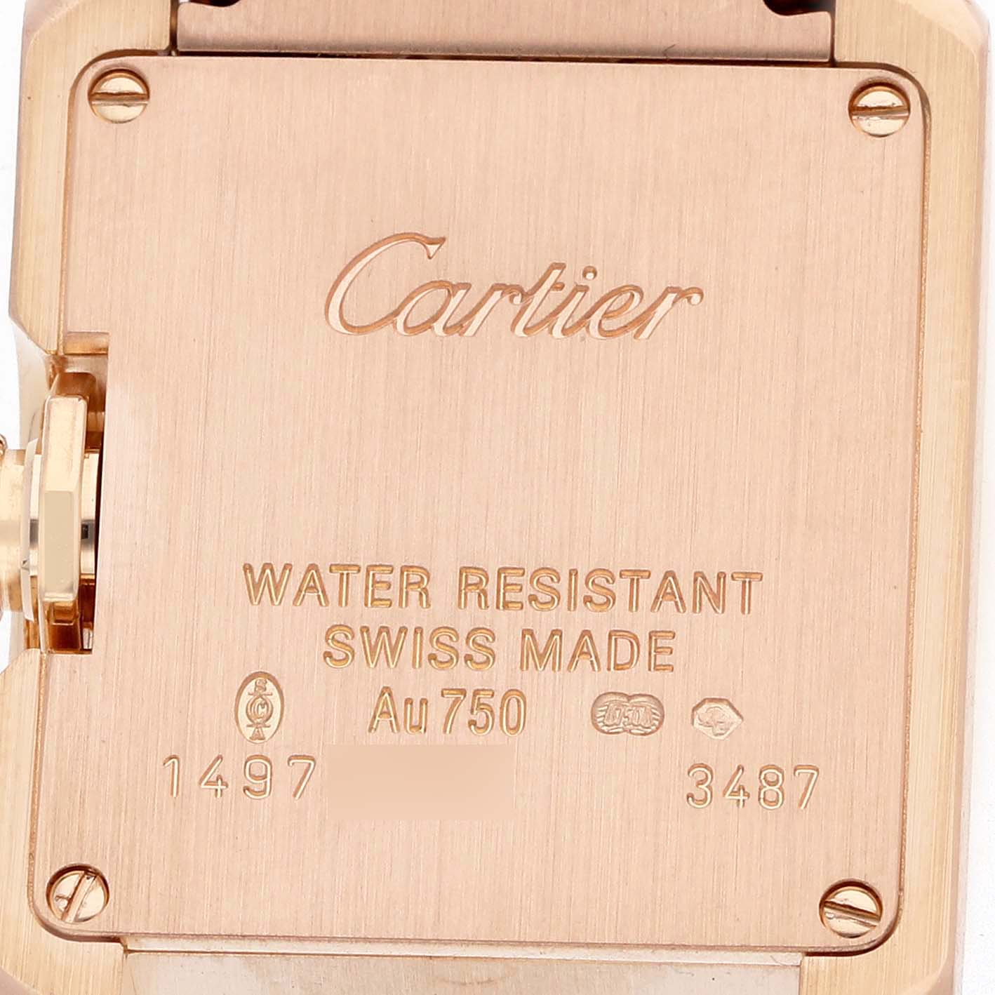 The image shows the back case of the Cartier Tank Anglaise WT100002 Women's Rose Gold Silver Dial watch, displaying engravings and jewelers' marks.