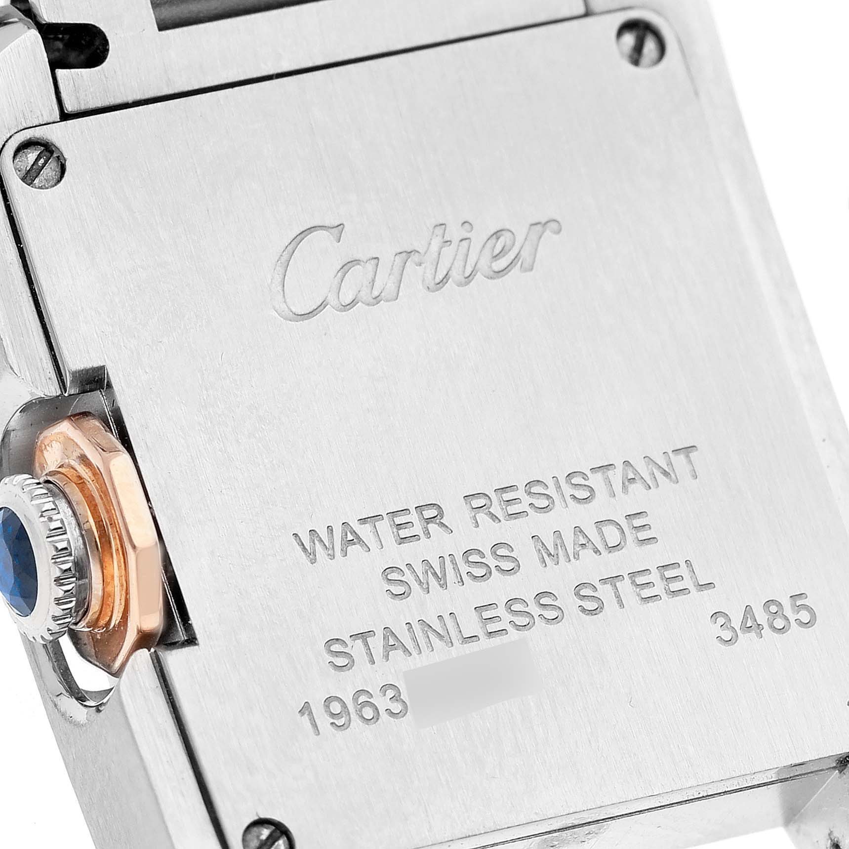 The image shows the back case and crown of a Cartier Tank Anglaise W5310019 Women
s Steel and Gold (two tone) Silver Dial W5310019 Women
s Steel and Gold (two tone) Silver Dial watch, highlighting its "Water Resistant" and "Stainless Steel" markings.