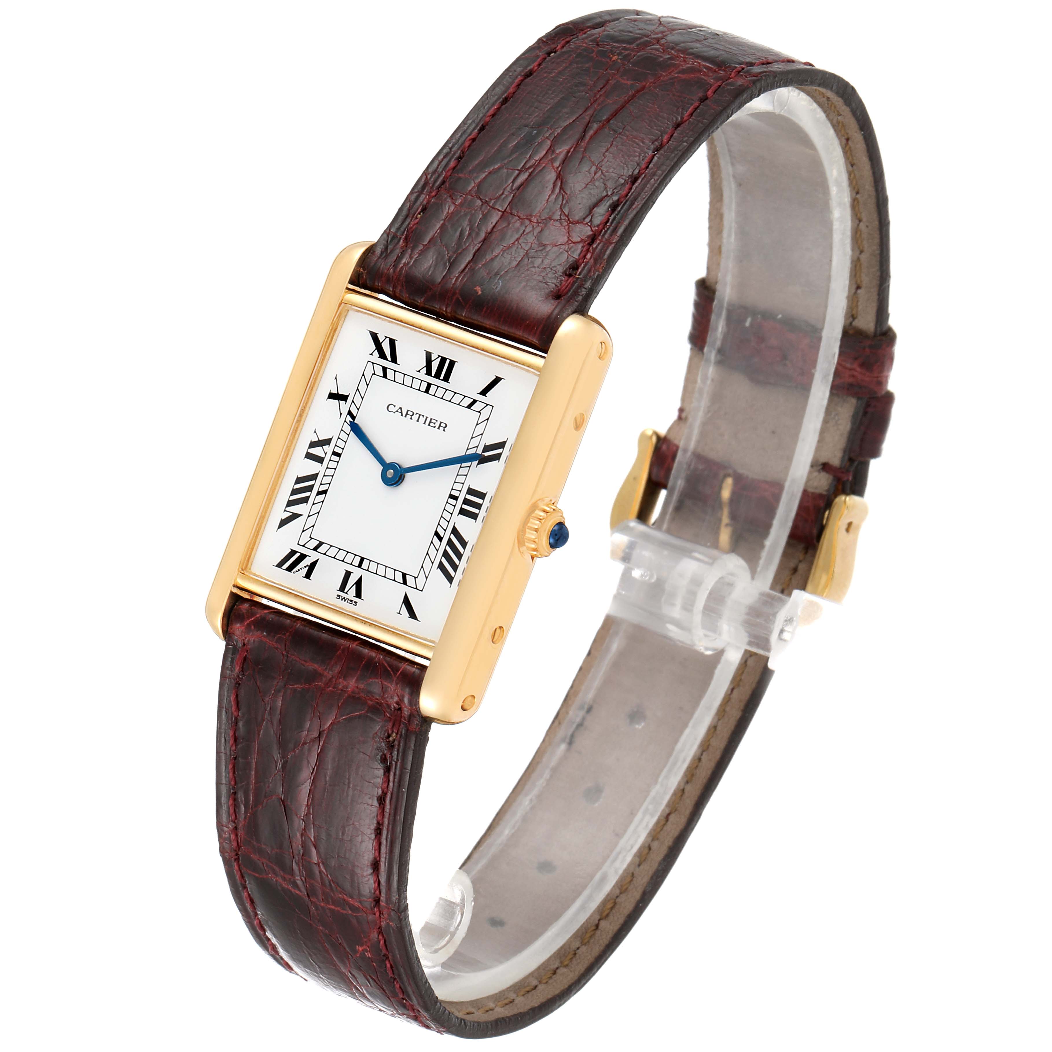 This image shows a Cartier Tank Classic  Women's Yellow Gold White Dial  Women's Yellow Gold White Dial watch at a three-quarter angle displaying the face, strap, and gold casing.