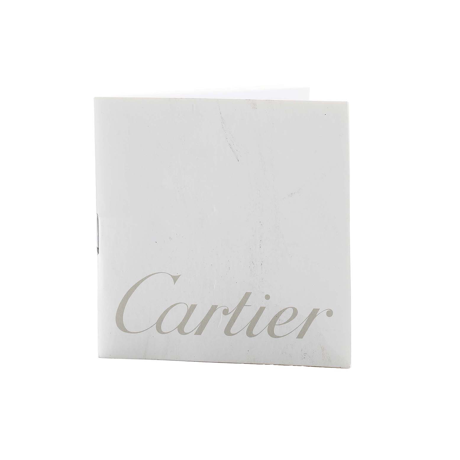 The image shows a Cartier Tank MC W5330007 Men's Stainless Steel Silver Dial booklet, primarily displaying the brand logo.