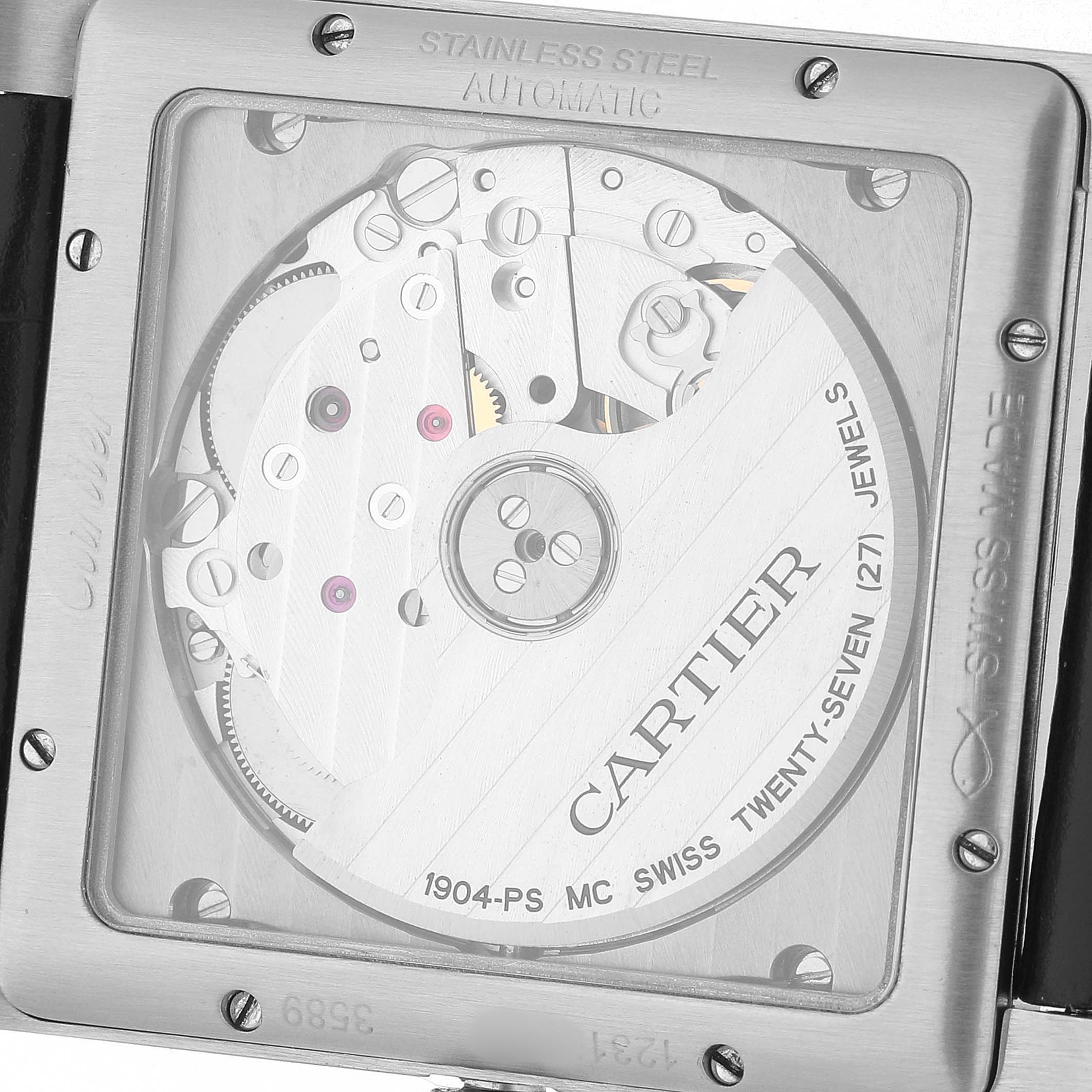 The image shows the back of a Cartier Tank MC W5330003 Men's Stainless Steel Silver Dial watch, highlighting its automatic movement and inner mechanics.