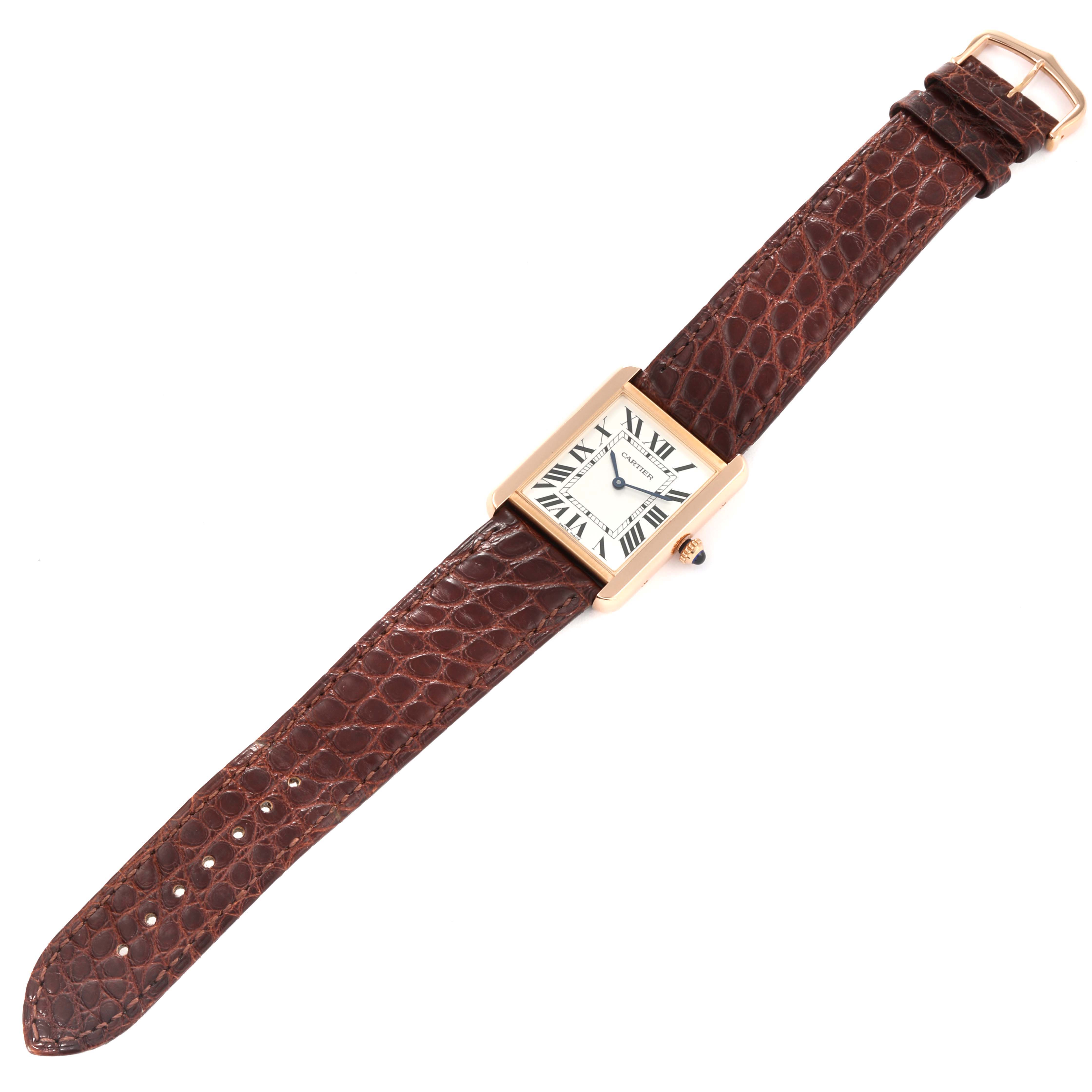 The image shows a Cartier Tank Solo W5200025 Men
s Steel and Gold (two tone) Silver Dial W5200025 Men
s Steel and Gold (two tone) Silver Dial watch, view from above, displaying its rectangular face and brown leather strap.