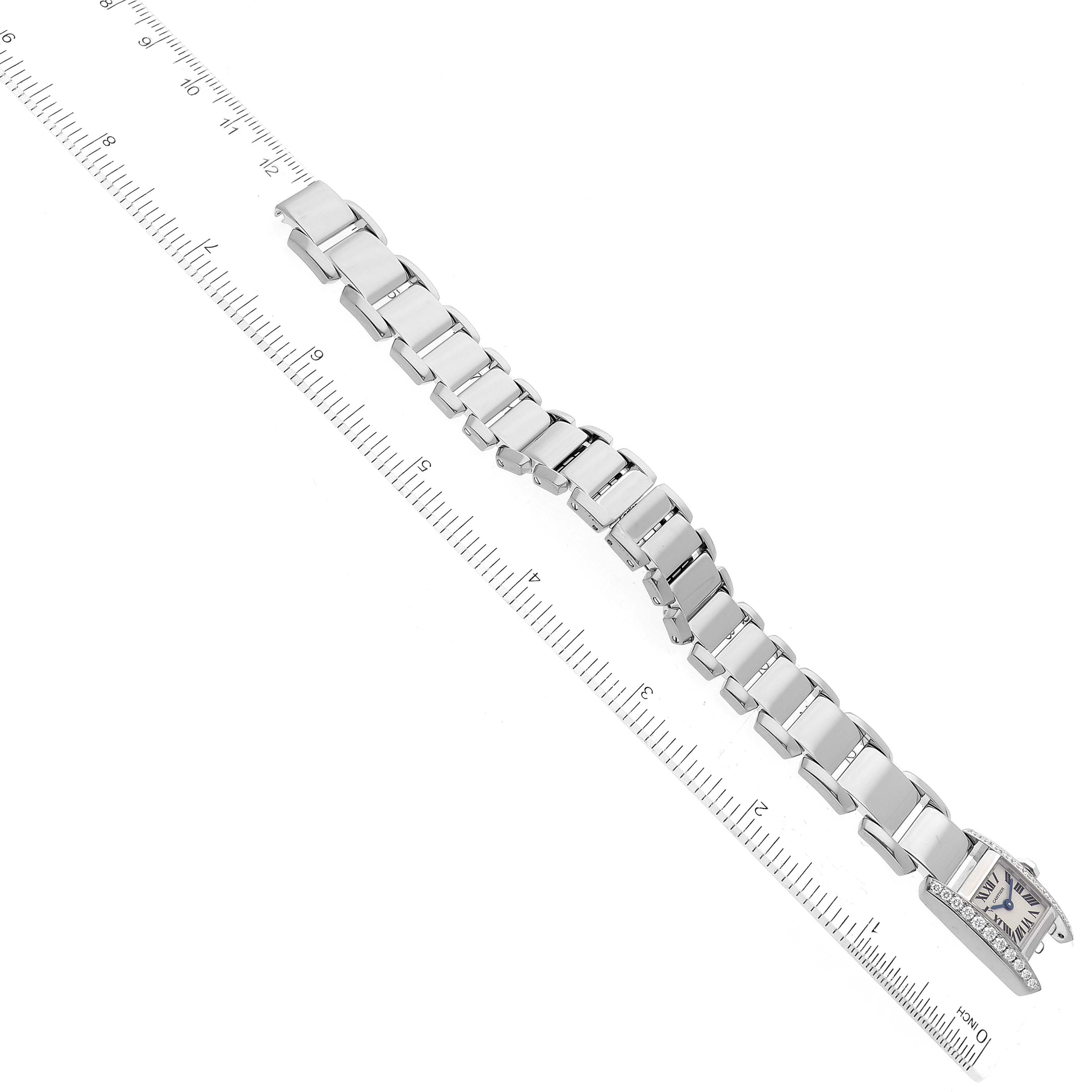 The image shows the bracelet and part of the face of a Cartier Tankissime WE70069H Women's White Gold Silver Dial WE70069H Women's White Gold Silver Dial watch, measured alongside a ruler.
