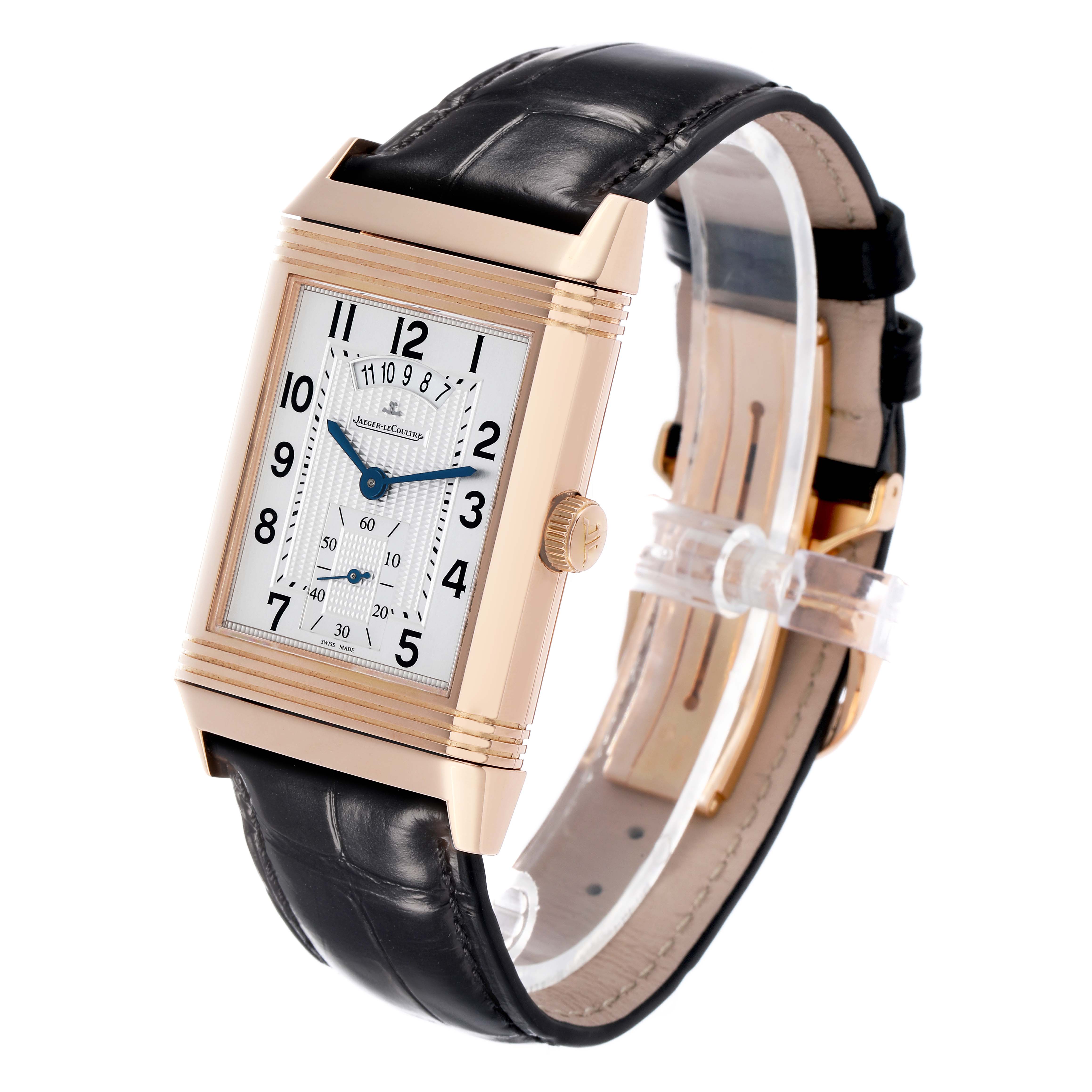 The Jaeger-LeCoultre Reverso watch is shown at a three-quarter angle, displaying its face, case, strap, and crown.
