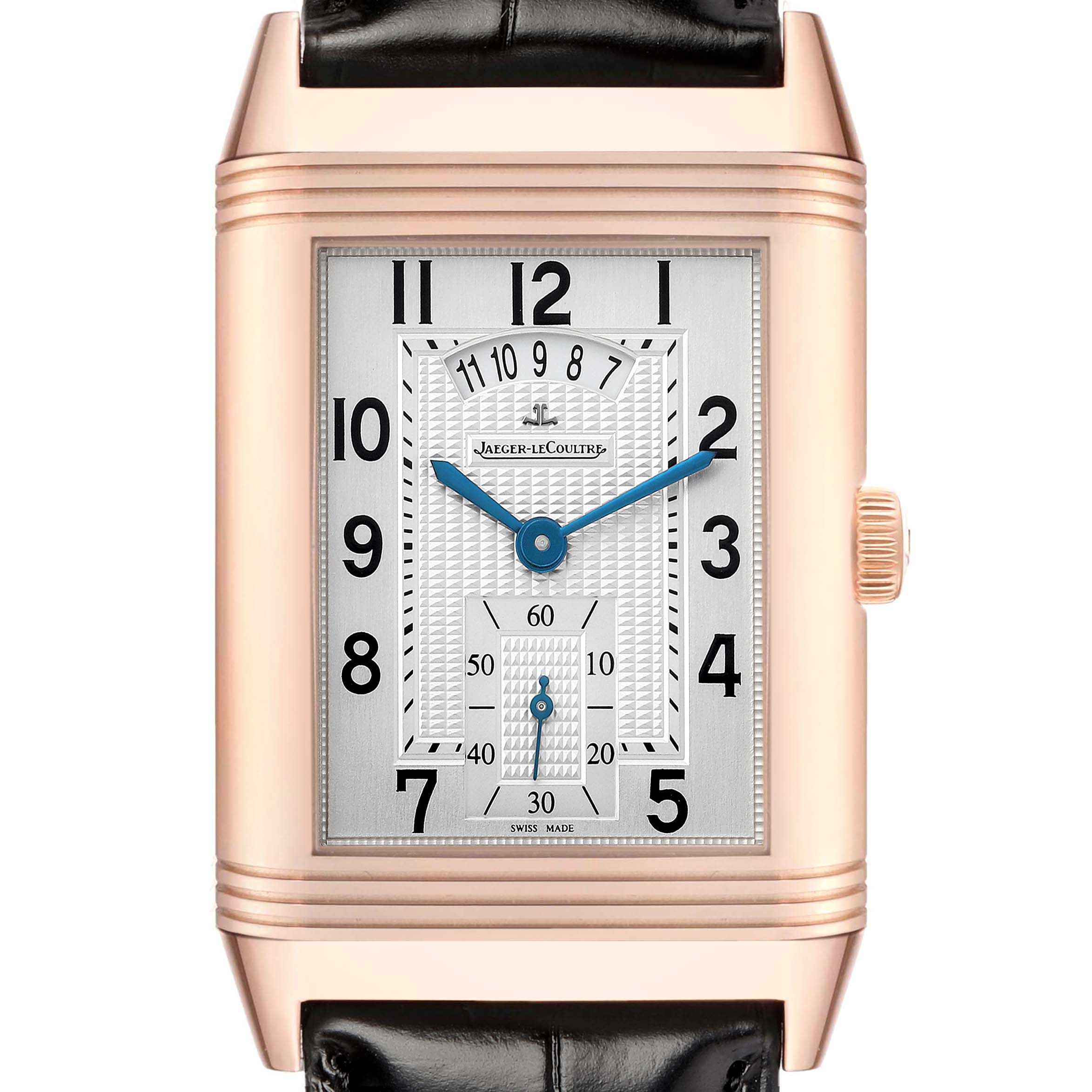 The Jaeger-LeCoultre Reverso watch is shown from a front angle, highlighting its unique dial and rectangular case design.