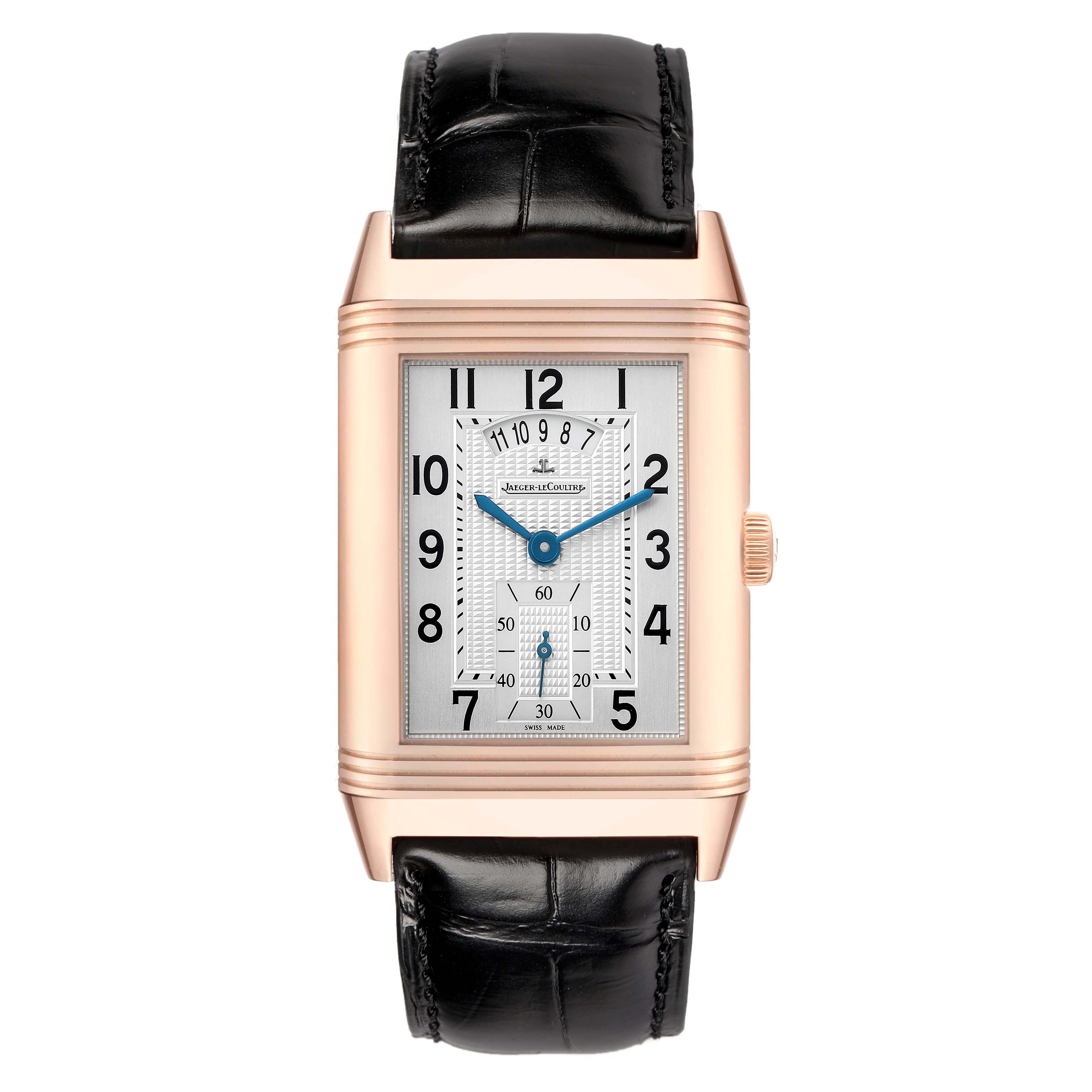 The Jaeger-LeCoultre Reverso watch is shown from the front, highlighting the dial, hands, case, and strap.