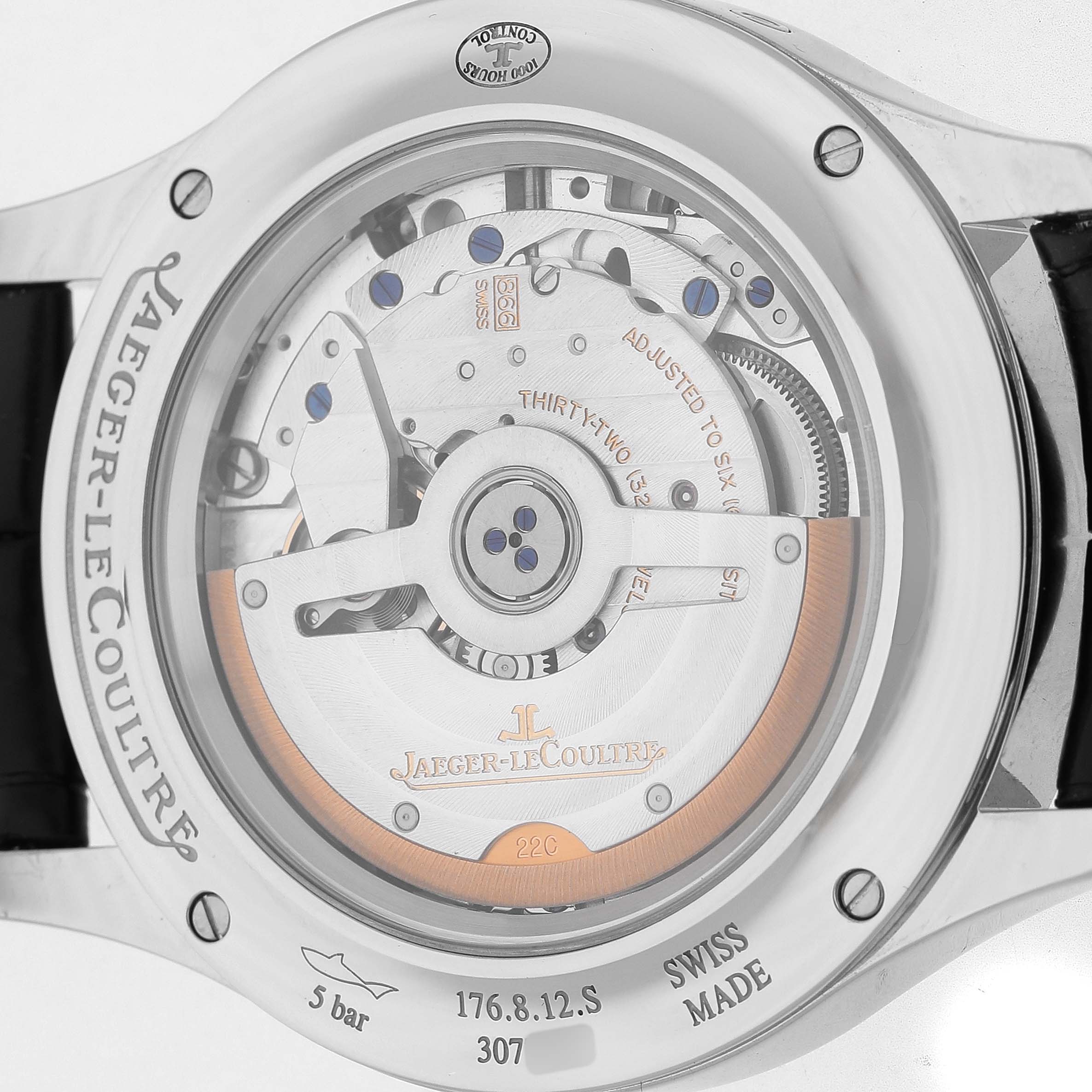 The image shows the back of a Jaeger-LeCoultre Master watch, revealing its internal mechanism and rotor.