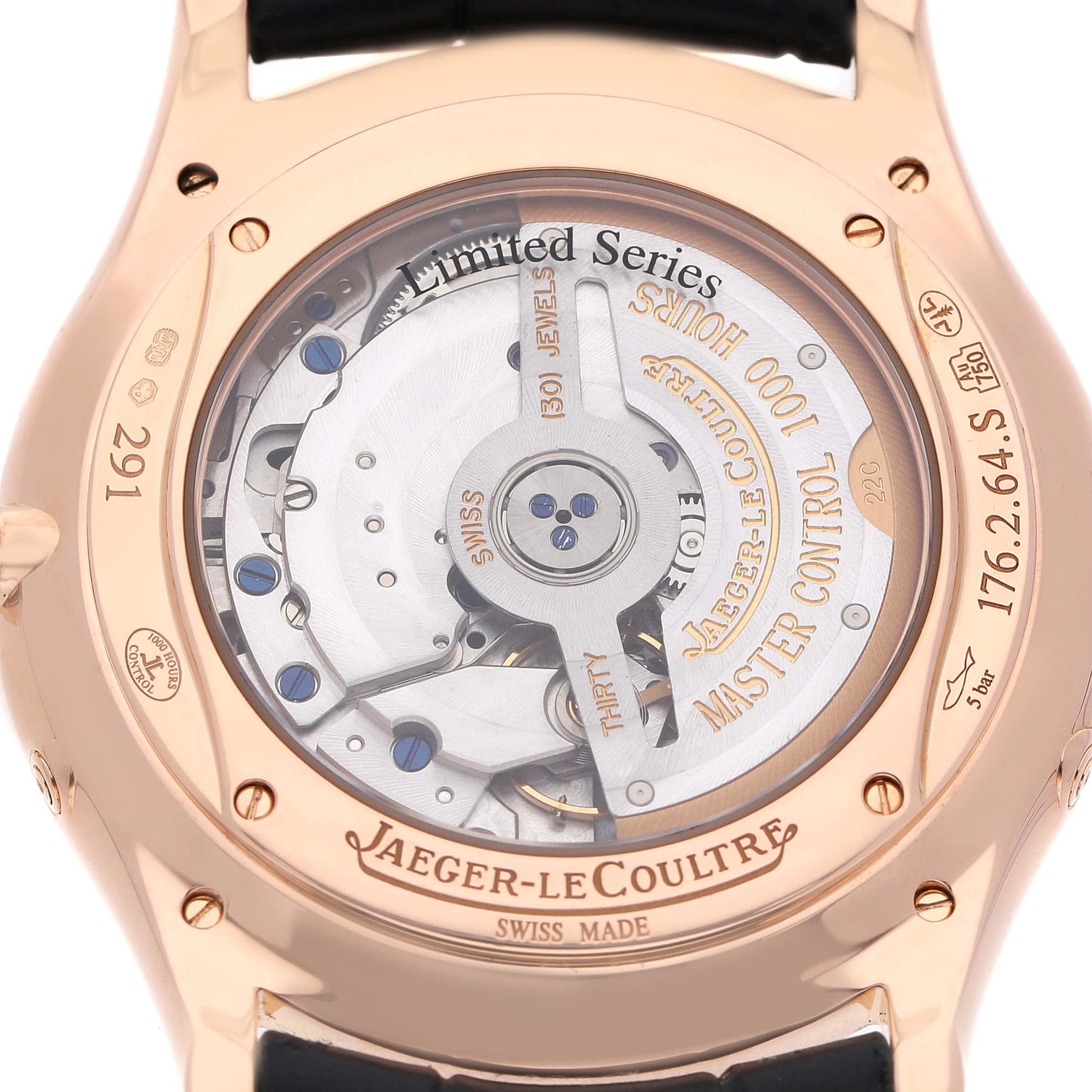 The image shows the back of a Jaeger-LeCoultre Master model, highlighting the movement and engravings.