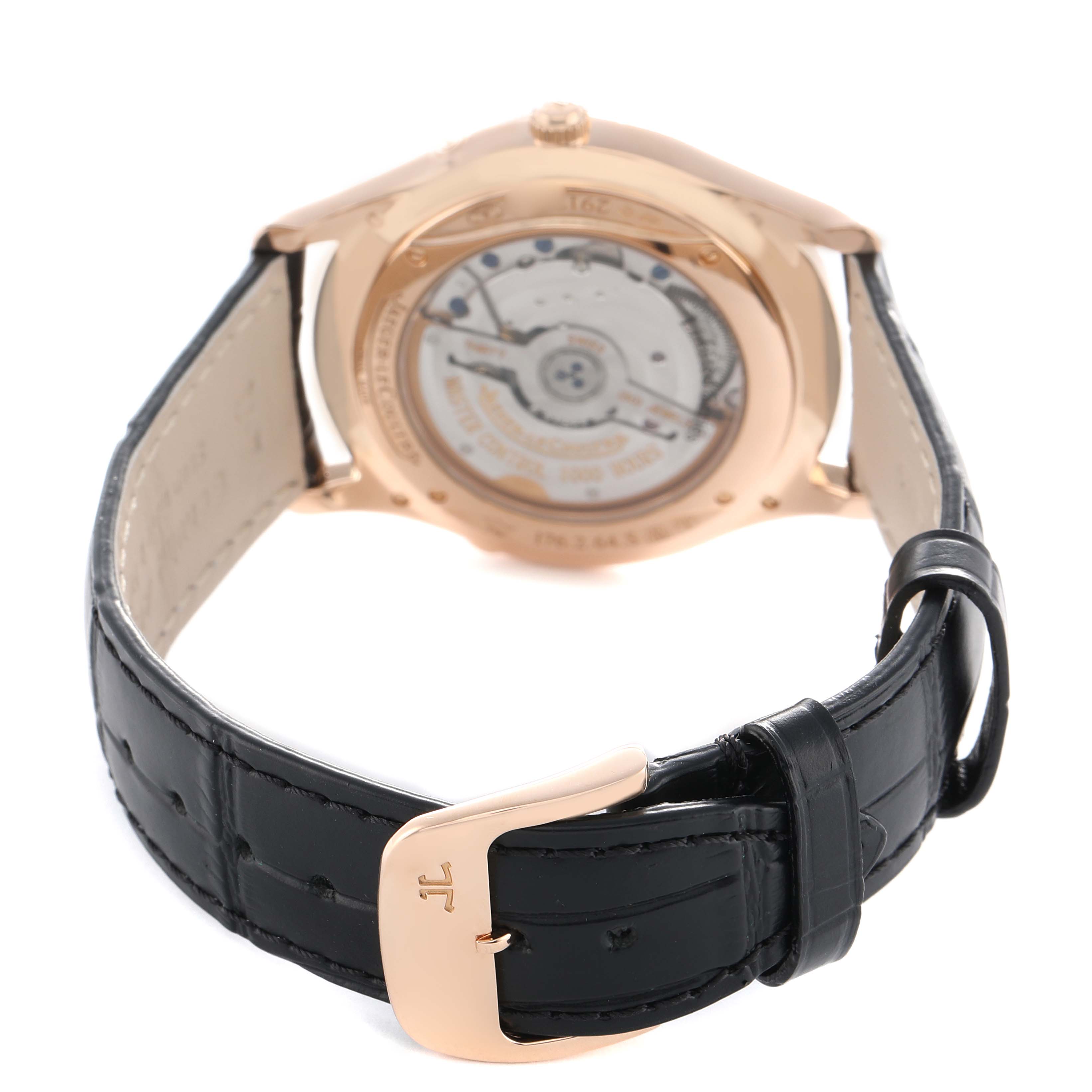 The image shows the back view of a Jaeger LeCoultre Master Q136256C Men's Rose Gold Brown Dial watch with the open case back and leather strap with buckle.