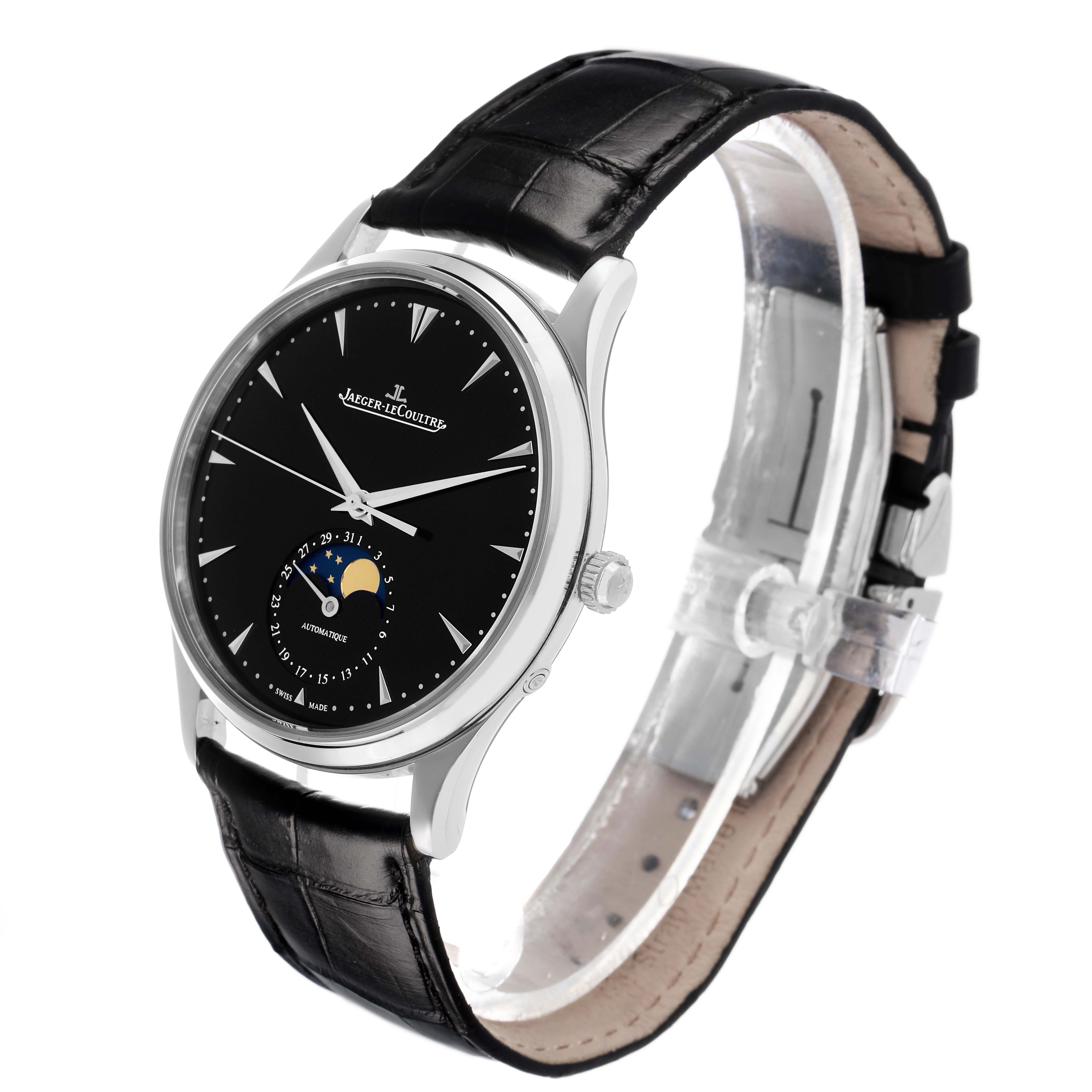 The Jaeger-LeCoultre Master watch is shown at a slight angle, highlighting the black dial, moon phase, and leather strap.