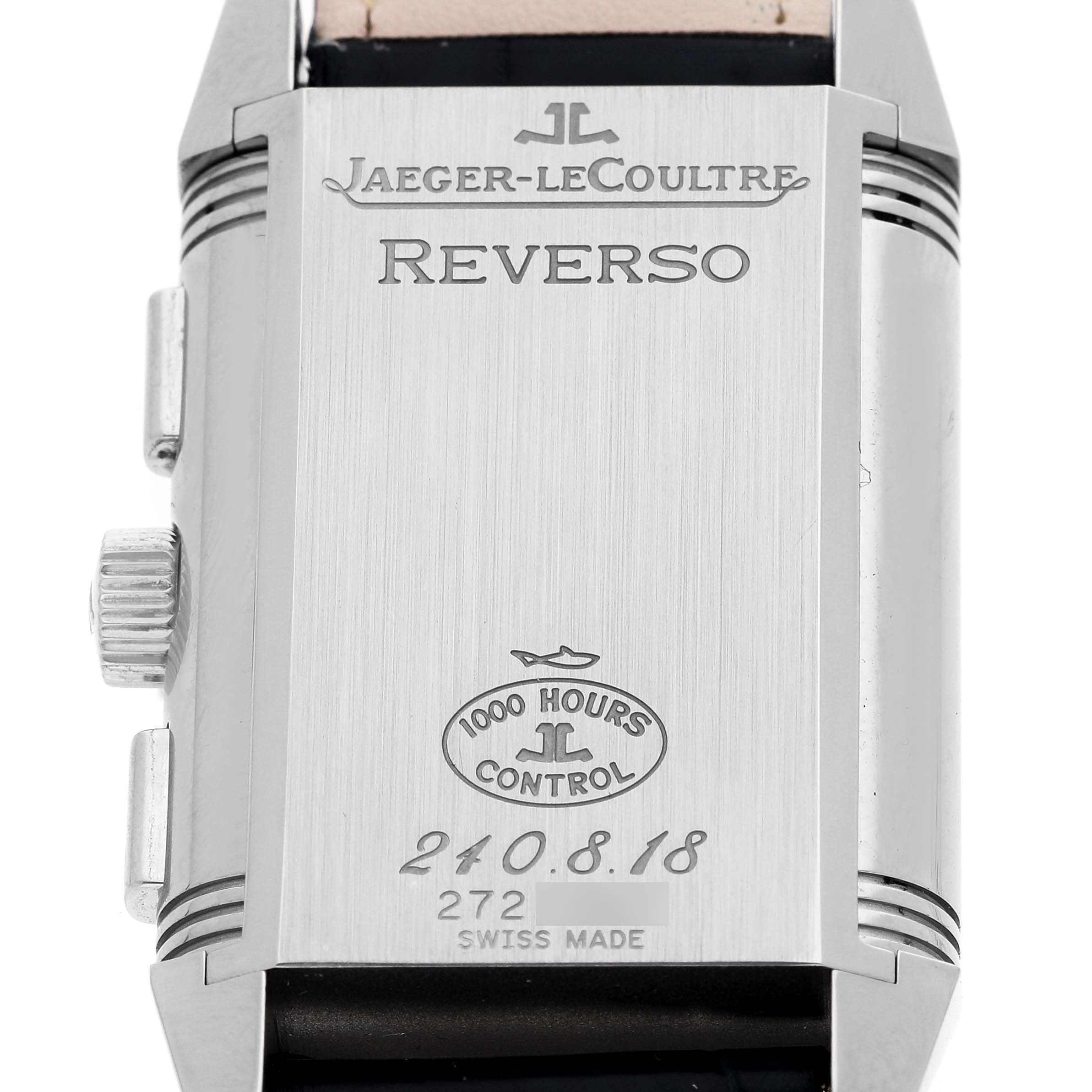 The image shows the back of a Jaeger LeCoultre Reverso Q3028420 Men's Stainless Steel Silver Dial watch, highlighting engravings and certifications.