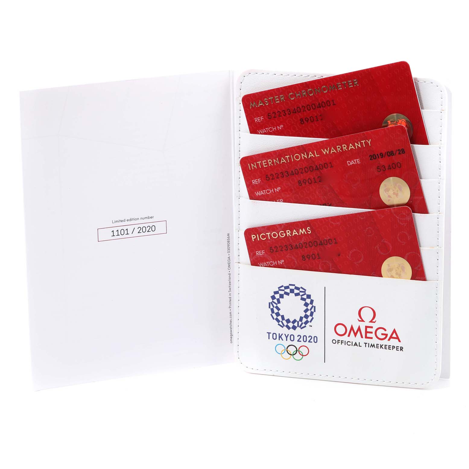 This image shows documentation and warranty cards for an Omega Planet Ocean 522.33.40.20.04.001 Men's Stainless Steel White Dial 522.33.40.20.04.001 Men's Stainless Steel White Dial watch, featuring the Tokyo 2020 logo and Omega branding.