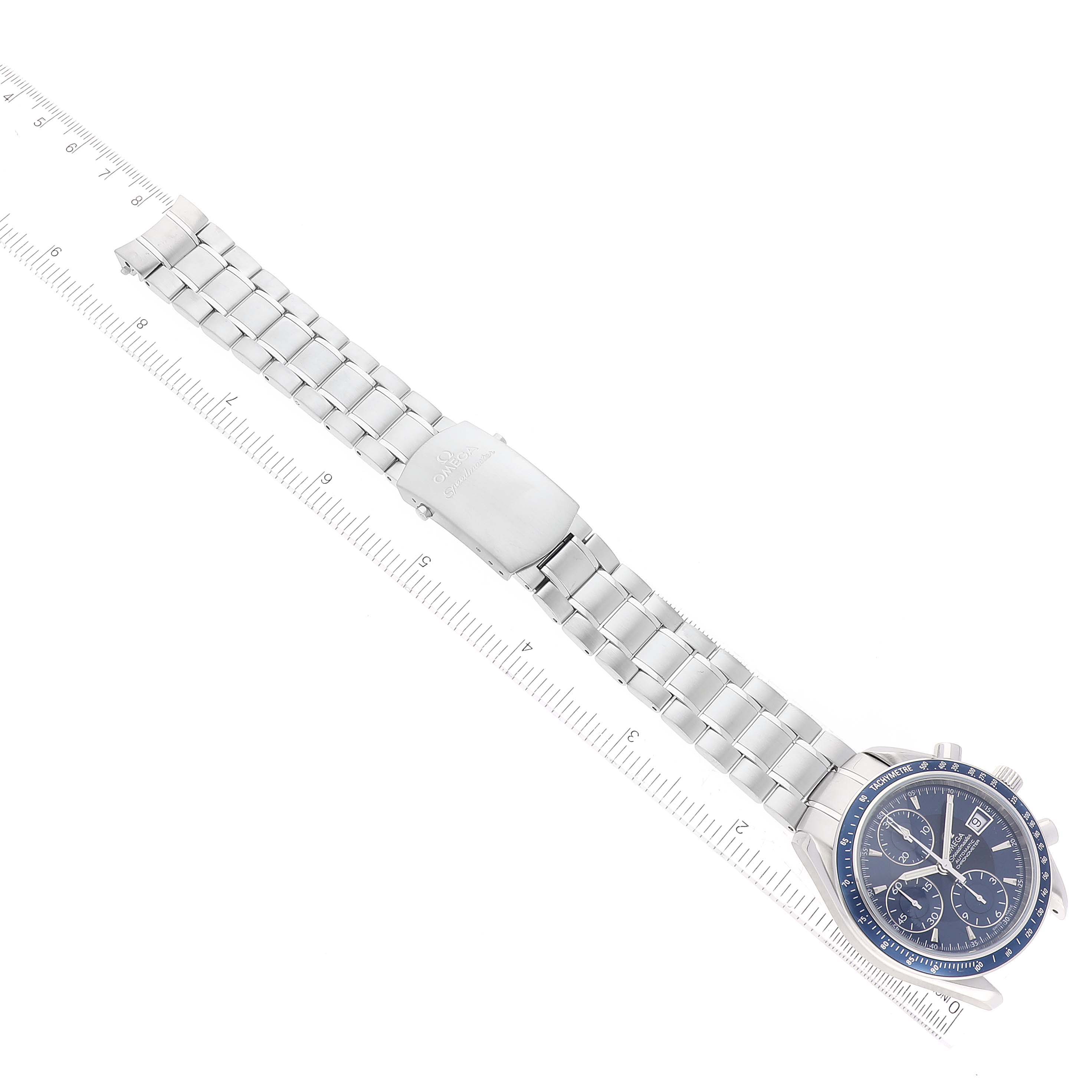 The Omega Speedmaster 3212.80.00 Men
s Stainless Steel Blue Dial 3212.80.00 Men
s Stainless Steel Blue Dial watch is shown from a top-down angle, displaying its face, metal bracelet, and clasp.