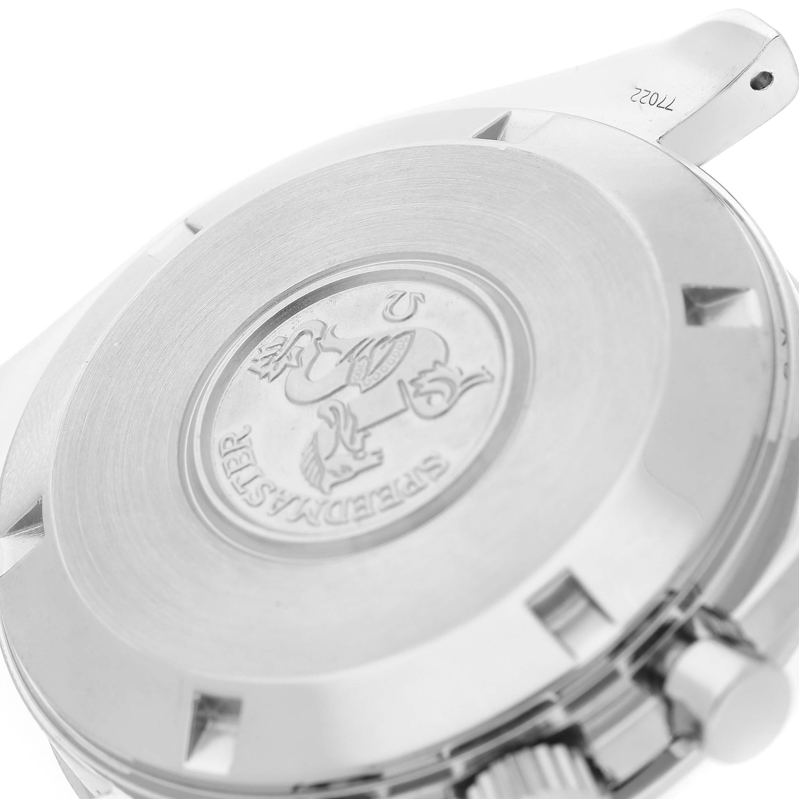 This image shows the back case of the Omega Speedmaster 3594.50.00 Men
s Stainless Steel Black Dial 3594.50.00 Men
s Stainless Steel Black Dial watch, highlighting its engraved emblem and serial number.