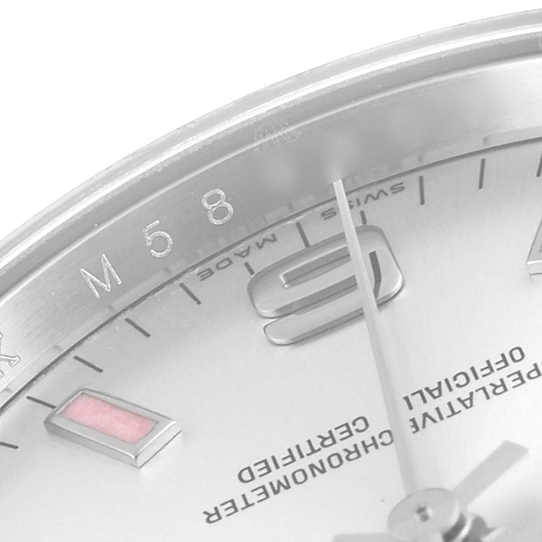 This close-up image shows part of the dial and hour markers of the Rolex Air-King 114200 Men's Stainless Steel Silver Dial 114200 Men's Stainless Steel Silver Dial watch.