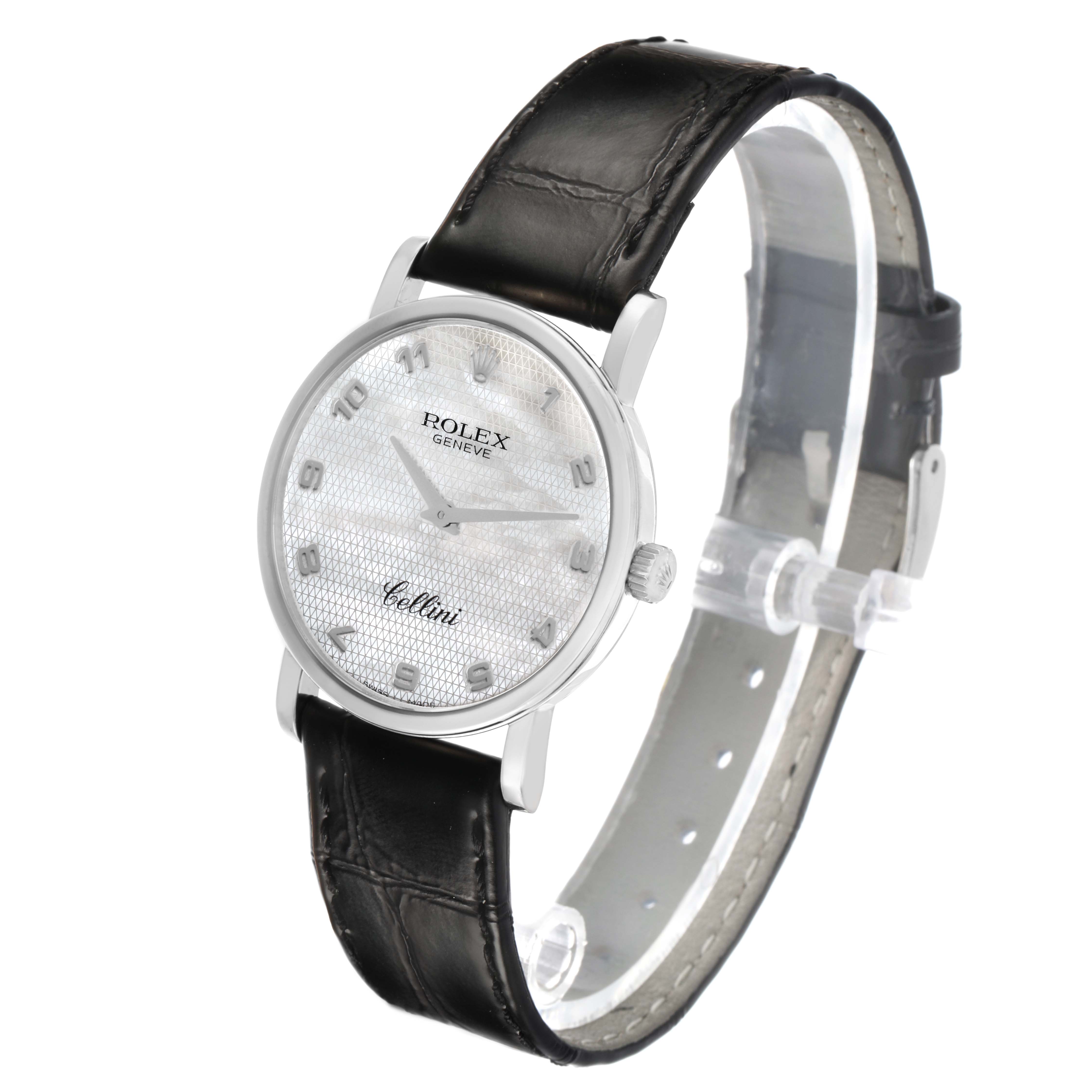 The image shows a side-angle view of the Rolex Cellini 5115 Men's White Gold Mother of Pearl Dial watch, highlighting its face, bezel, and leather strap.