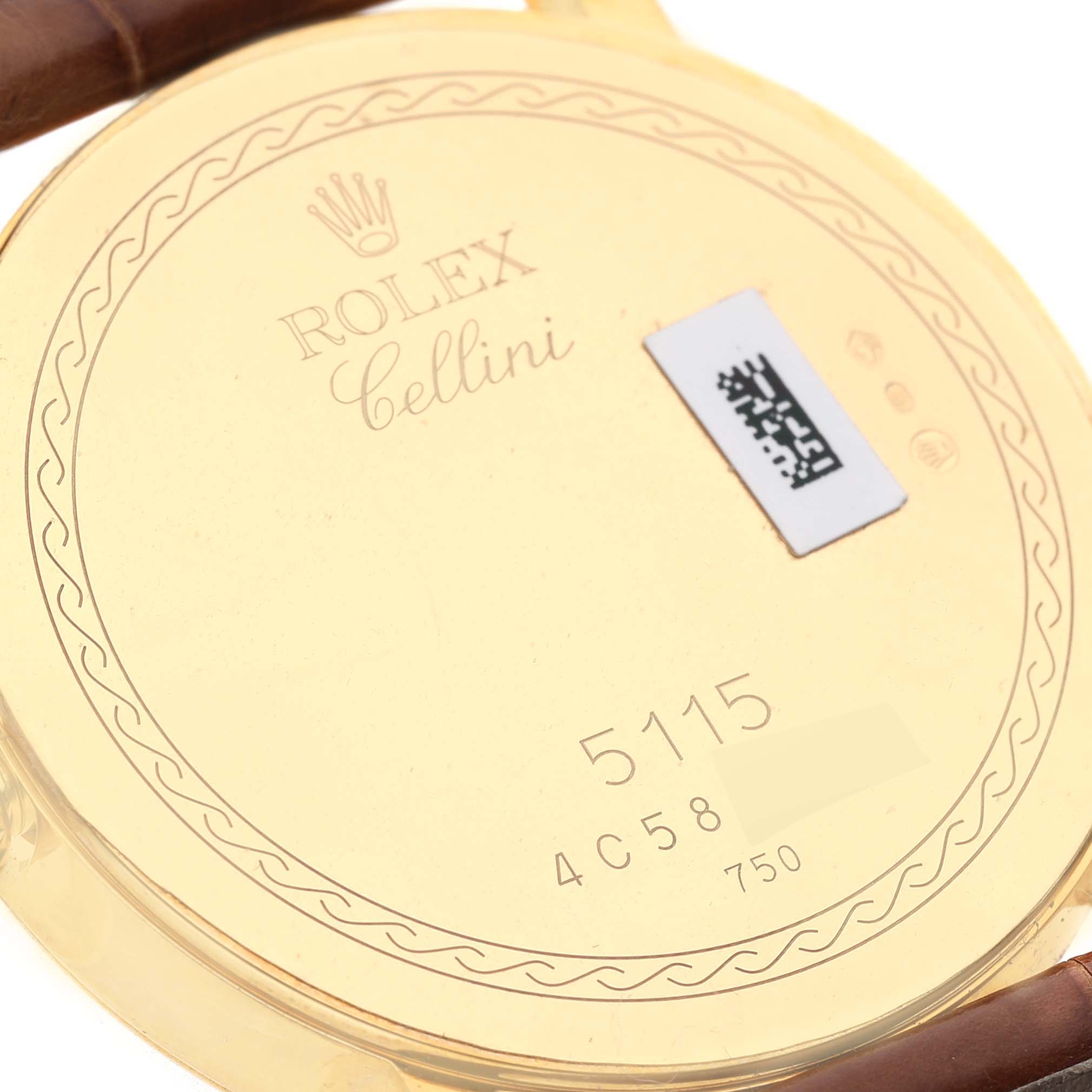 The image shows the back case of a Rolex Cellini 5115/8 Men's Yellow Gold Mother of Pearl Dial 5115/8 Men's Yellow Gold Mother of Pearl Dial watch, featuring the model number and brand engravings.