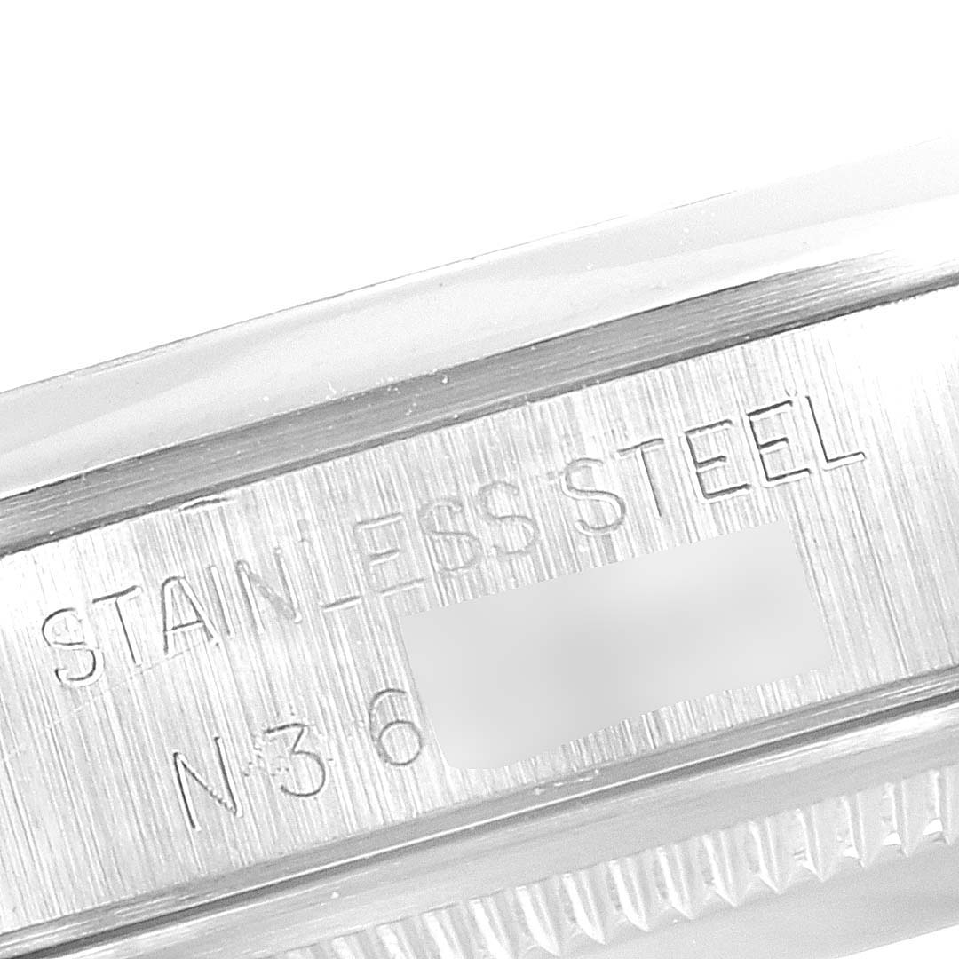 This image shows a close-up of the side of a stainless steel Rolex Date 15200 Men's Stainless Steel Silver Dial 15200 Men's Stainless Steel Silver Dial model watch.