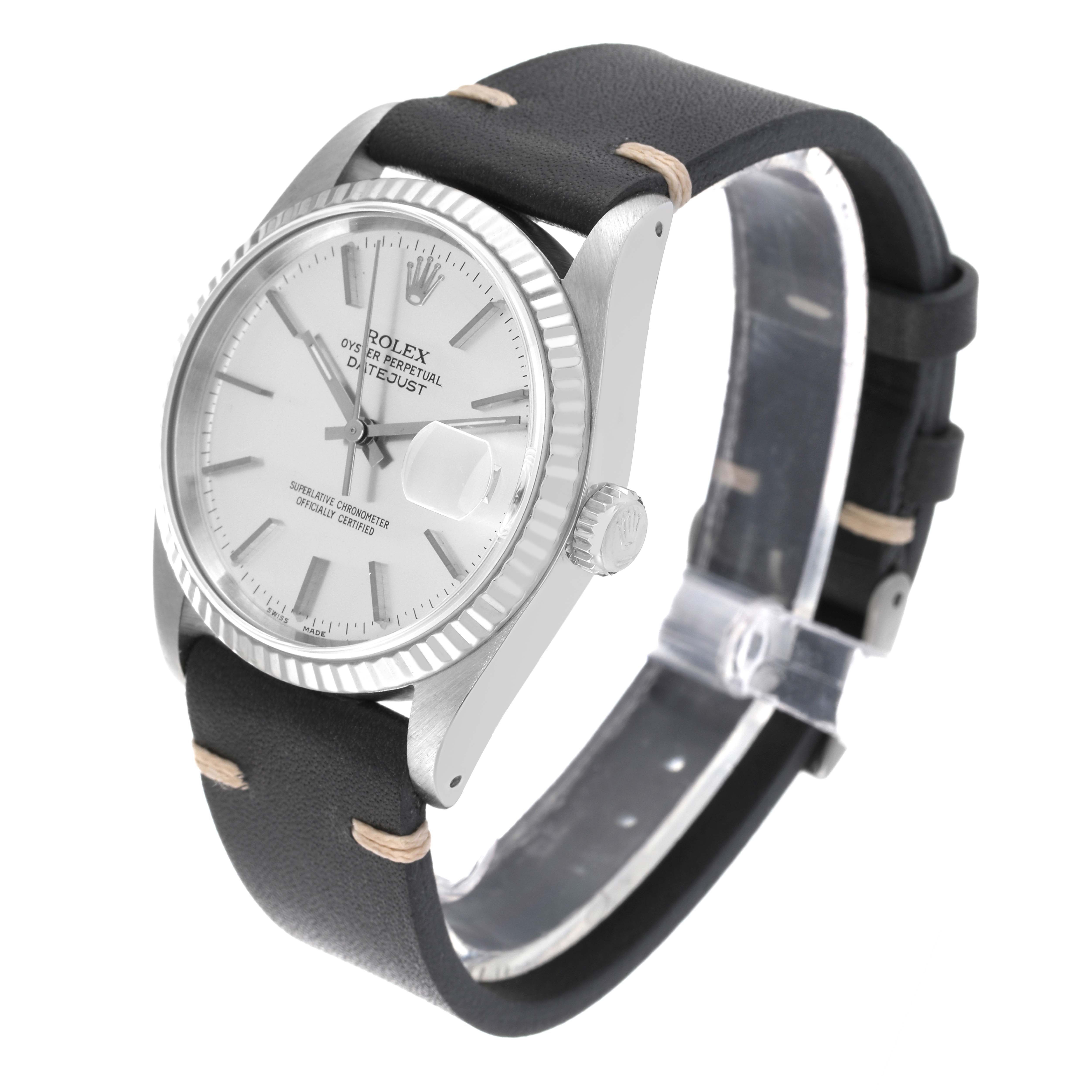 The Rolex Datejust 16234 Men's Stainless Steel Silver Dial 16234 Men's Stainless Steel Silver Dial watch is shown at a slight angle, highlighting the face, bezel, crown, and black leather strap.