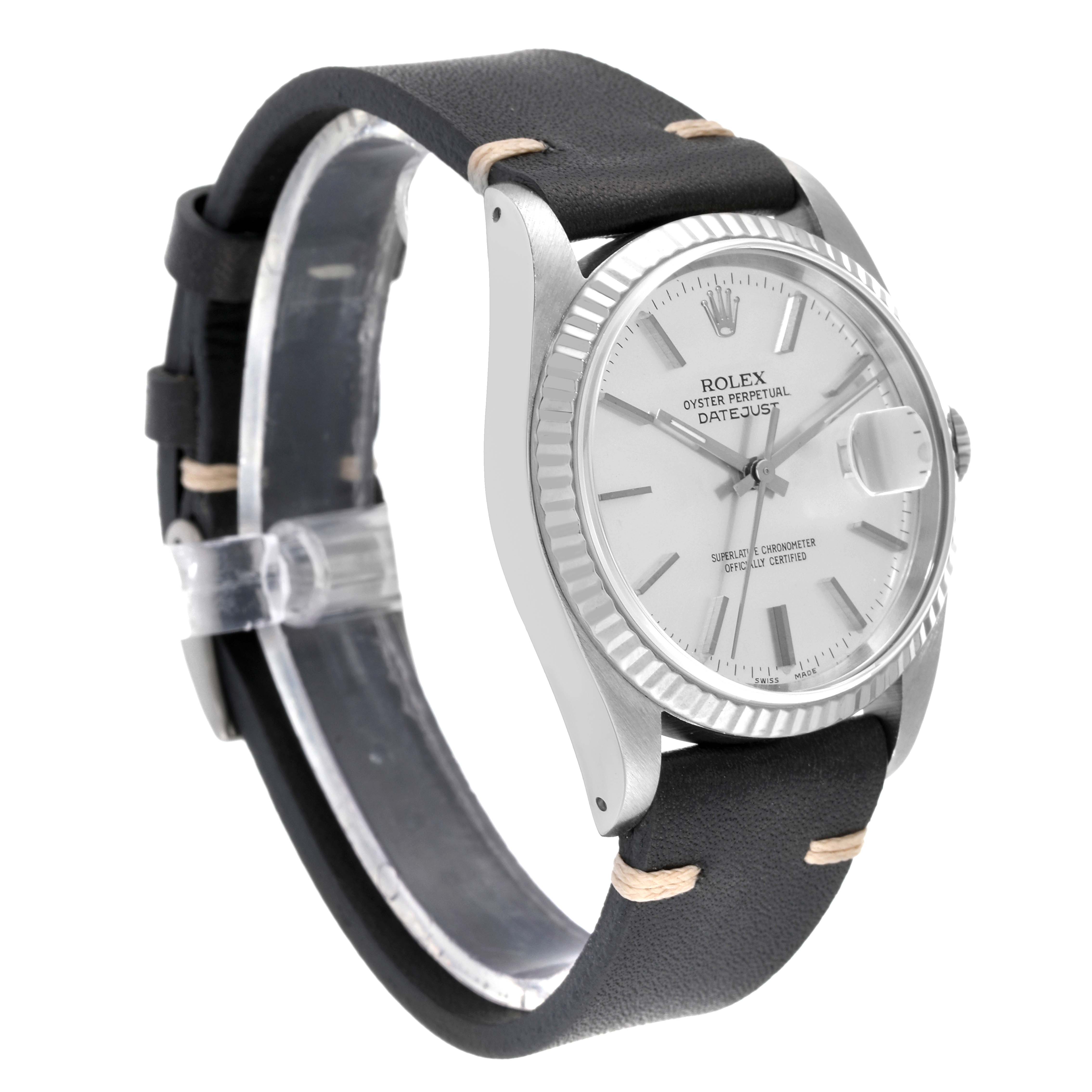 The Rolex Datejust 16234 Men's Stainless Steel Silver Dial 16234 Men's Stainless Steel Silver Dial watch is shown at an oblique front angle, highlighting its dial, bezel, and black strap.