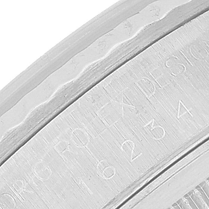 This close-up angle shows the engraved details on the back of the bezel of a Rolex Datejust 16234 Men's Stainless Steel Silver Dial 16234 Men's Stainless Steel Silver Dial watch.